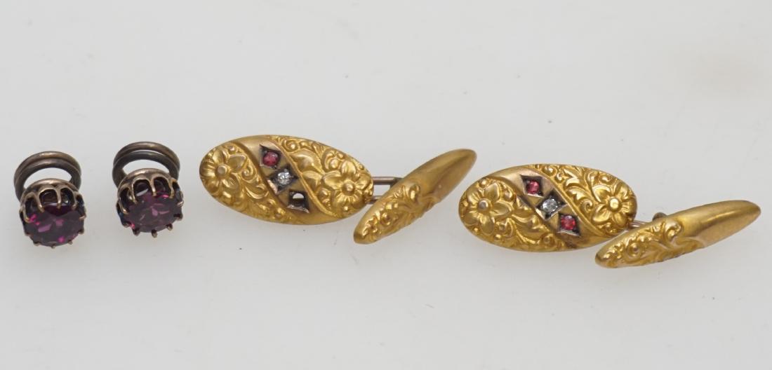2 ANTIQUE 10k CUFF LINKS & LAPEL PINS: 1- Edwardian 10k Gold Cufflinks, missing 1 stone. 1- Pair 10k Lapel pins with purple stone. Weight 2.1dwt, 3.2 grams. PROVENANCE: A Private Charleston SC Estate.