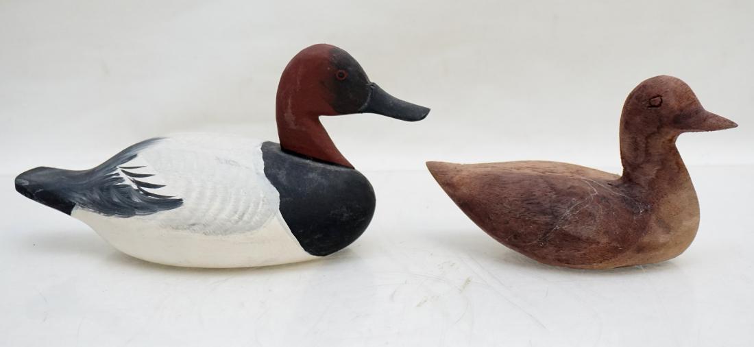 2 SMALL HAND CARVED DECOYS: Two small Vintage Hand Carved Decoys. The painted miniature Drake Canvasback was done by Captain Jesse Urie (1901-1978) Rock Hall, MD in 1974. Jess Urie made his living by fishing and renting party bo