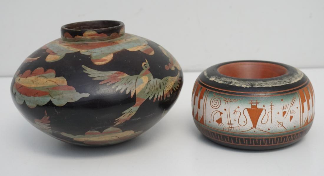 2 PC NATIVE AMERICAN POTTERY: Two 20th c. Native American Pottery Bowls. Both signed. Smallest 5 1/4"x5 1/4"x3, wear to top and largest with Clouds and Birds 7"x7"x5 1/2". Weight combined for shipping 2 pds 7 oz. PROVENANCE: A Cha