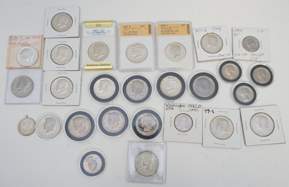 20 HALF DOLLARS 7 QUARTERS: 20 Kennedy Half Dollars and 7 quarters, One of the quarters is a 2006 North Dakota and has a slip with it that says error smoking bird. Great lot for the collector. Weight 1 pd 7 oz. PROVENANCE: A Cha