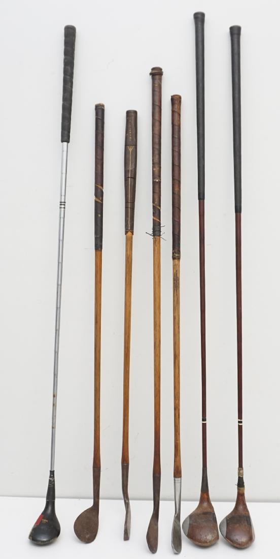 7 ANTIQUE / VINTAGE GOLF CLUBS: Seven Antique and Vintage Golf Clubs. 3 are wooden. Perfect group for the collector. great for display. Longest approximately 45". Weight 7 pds. PROVENANCE: A Charleston SC Private Estate.