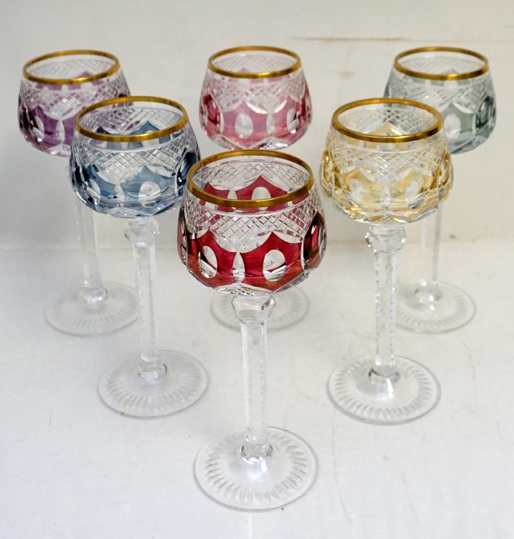 6 TALL CRYSTAL HOCK GLASSES CUT MULTI COLOR: Six Tall Bohemian Cut Crystal Wine Hocks. Multi colored with notched stems. Each 3"x3"x8 1/4". Weight on all 7 pds. PROVENANCE: A Charleston SC Private Estate.