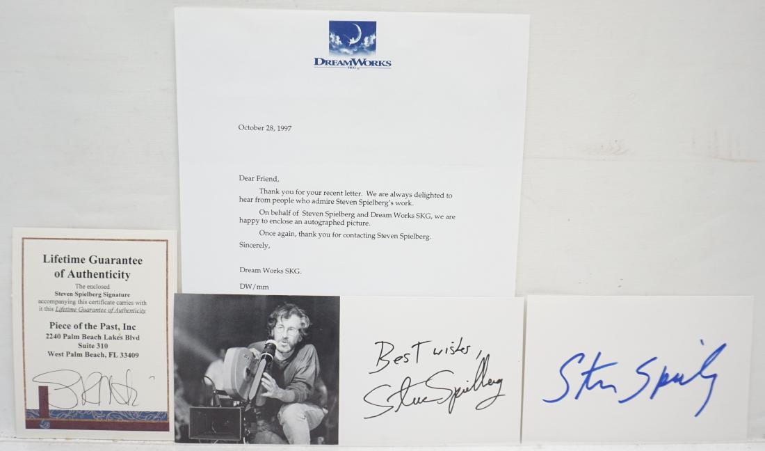 STEVEN SPIELBERG AUTOGRAPH: Steven Spielberg autographed 6x4" card with COA from Piece of the Past. There is also a 1997 letter from Dreamworks with a facsimile signed photograph. PROVENANCE: A Private Charleston SC Estate. Part