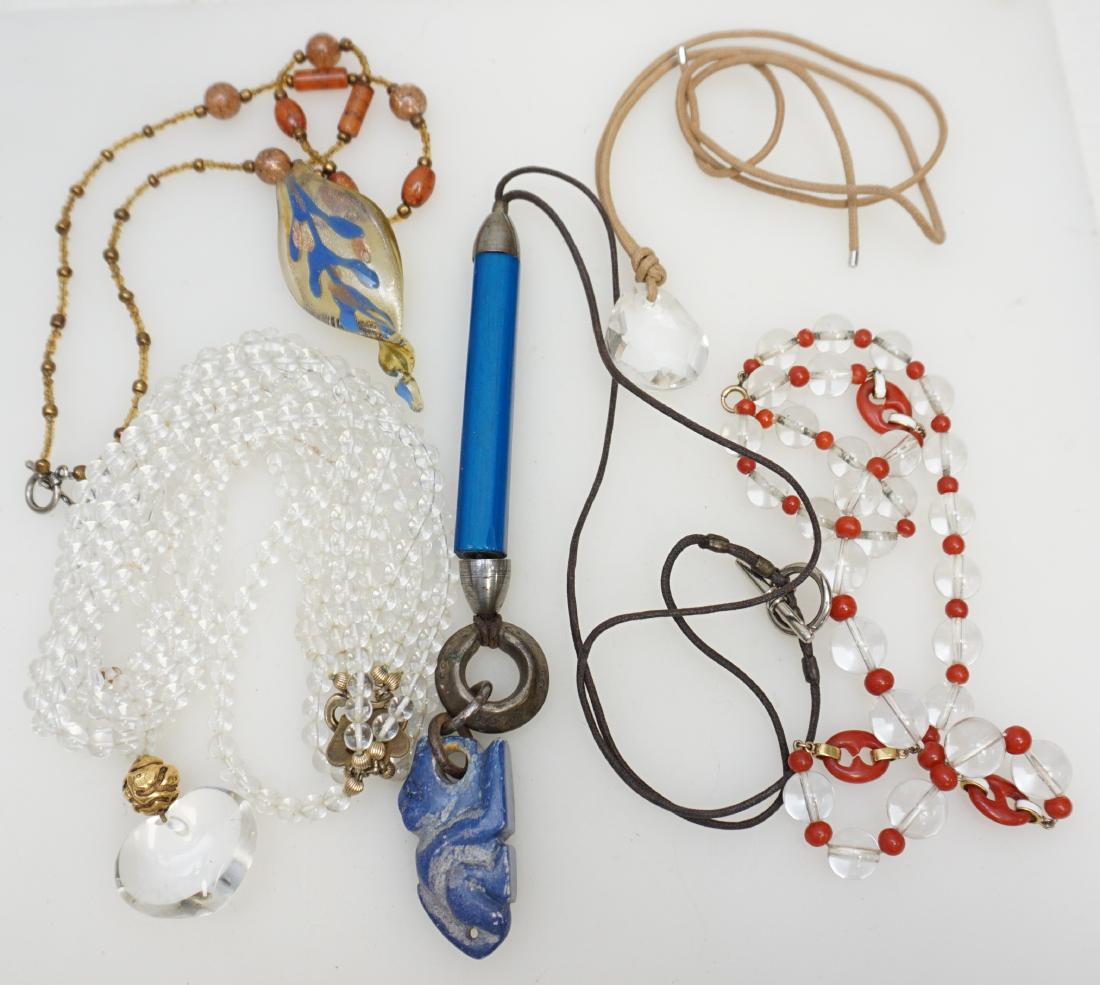 5 NECKLACES - ALICE KUO - LAPIS + SWAROVSKI: 1- Crystal Necklace with Red Spacers 11". 2- Venetian Glass Pendant Necklace 12". 3- Faceted Swarovski Crystal Pendant 1 1/2". 4- Lapis Carved Pendant 2". 5- Alice Kuo Crystal Necklace with Heart Pend
