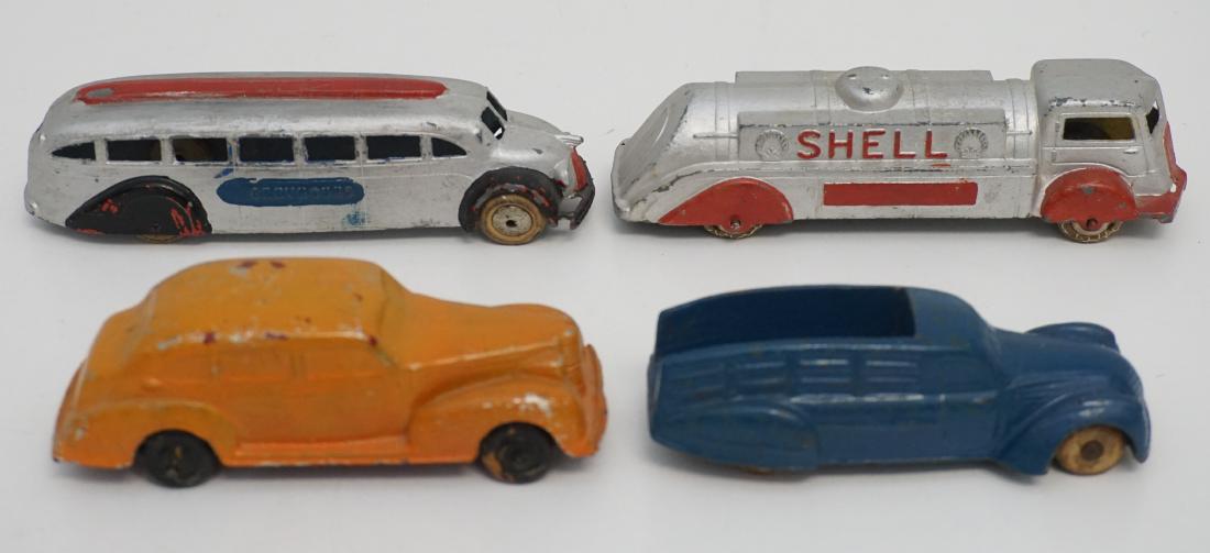 4 VINTAGE TOOTSIE TOYS + AUBURN: All are Vintage. 1- Tootsie Toy Shell 5 3/4". 2- Tootsietoy Greyhound 5 3/4". 3- The Sun Rubber Co Blue Pickup 5 1/4" 4- Auburn Rubber Co Orange Car 4 3/4". Weight on all 12 oz. PROVENANCE: A Private 