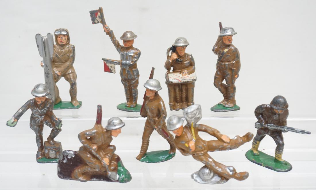 9 VINTAGE BARCLAY MANOIL LEAD SOLDIERS: 9 Vintage Barclay Manoil Lead Soldiers, Doughboys. Includes Parachute and Signal and more. Some paint loss to most. Weight on all 1 pd 12 oz. PROVENANCE: A Charleston SC Private Estate. The Barclay Ma