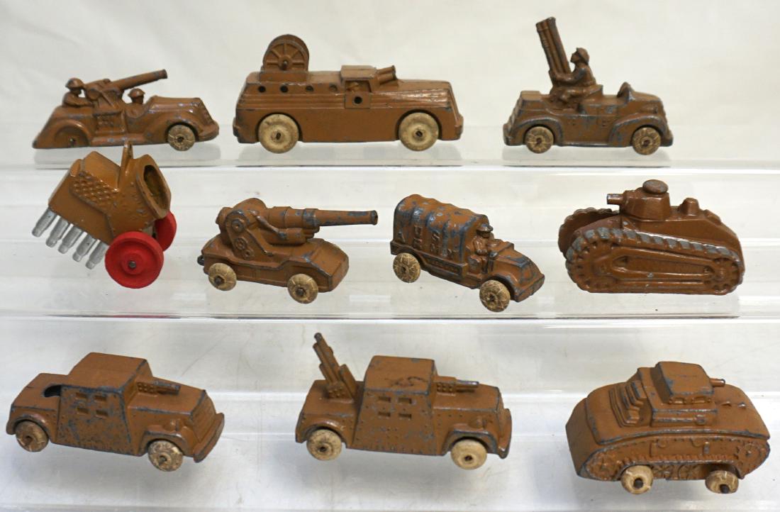 10 VINTAGE BARCLAY MANOIL LEAD SOLDIERS: 10 Vintage Barclay Manoil Lead Vehicles. Includes Tanks, Trucks and Armored Vehicles. Some paint loss to most, 2 missing wheels. Weight on all 1 pd 12 oz. PROVENANCE: A Charleston SC Private Estate. T