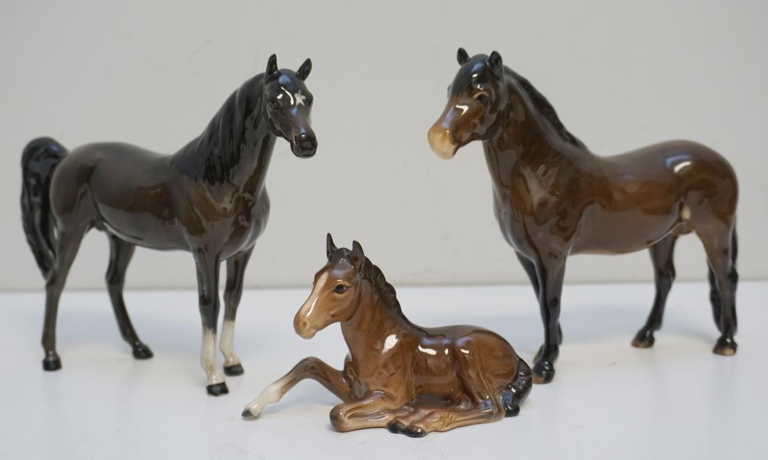 3 BESWICK HORSES: Three Vintage Beswick England Horses. Horse Family. 1 at 7" long 6 1/4" tall. 1 at 8"long, 6 1/2" tall. Foal at 5" long, 3 1/4" tall. Weight on all 2 pds 10 oz. PROVENANCE: A Charleston SC Private Est