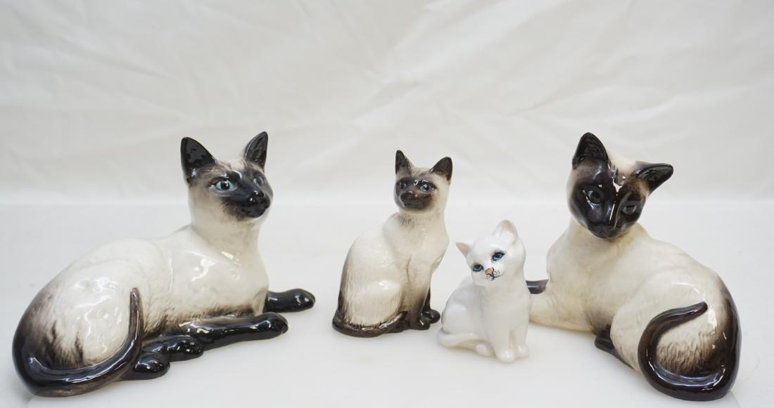 4 BESWICK CATS - SIAMESE +: Four Vintage Beswick England Cats. Good condition. Three Siamese, 1559 measures 7" long, 1558 7" long, 1887 " tall. In addition there is a White Persian Cat 3 1/4" Tall, Weight on all 1 pd. 10 oz. PRO