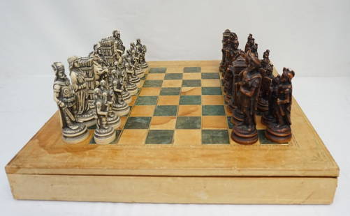 VINTAGE NIGRI CHESS SET ITALY: Vintage Nigri Chess Set, Made in Italy. 32 piece, plus leather topped board /box. One has head reglued. Board needs to be renailed at hinges. Board measures 16"x16"x2 1/4". Weight 6 pds. PROVENANCE: A