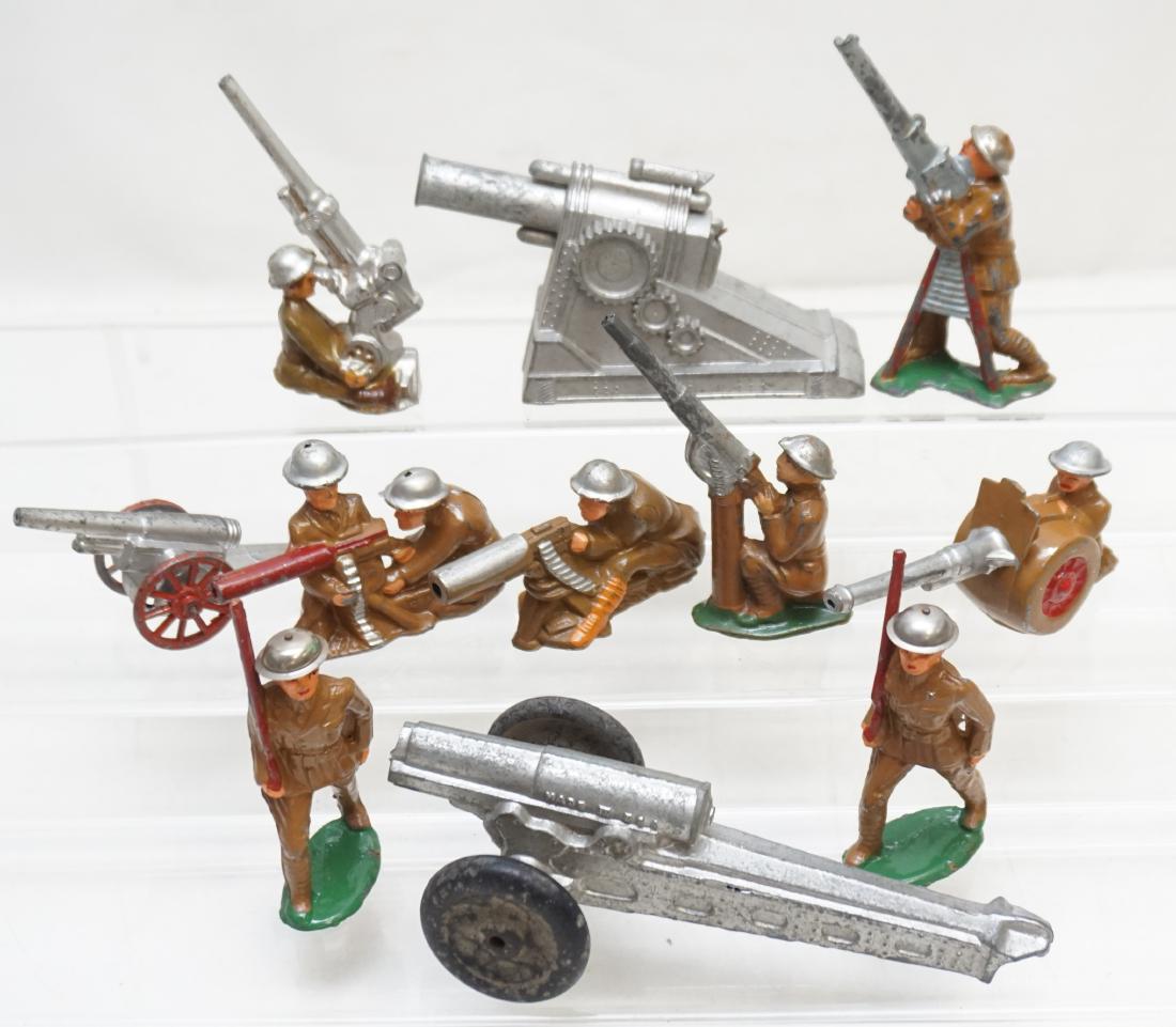 11 VINTAGE BARCLAY MANOIL LEAD DOUGHBOYS +: 11 Vintage Barclay Manoil Lead Military Doughboys and Cannons. Includes 3 Cannons and 3 Anti Aircraft Doughboys. Some minor paint loss to most. Weight on all 2 pds. PROVENANCE: A Charleston SC Private
