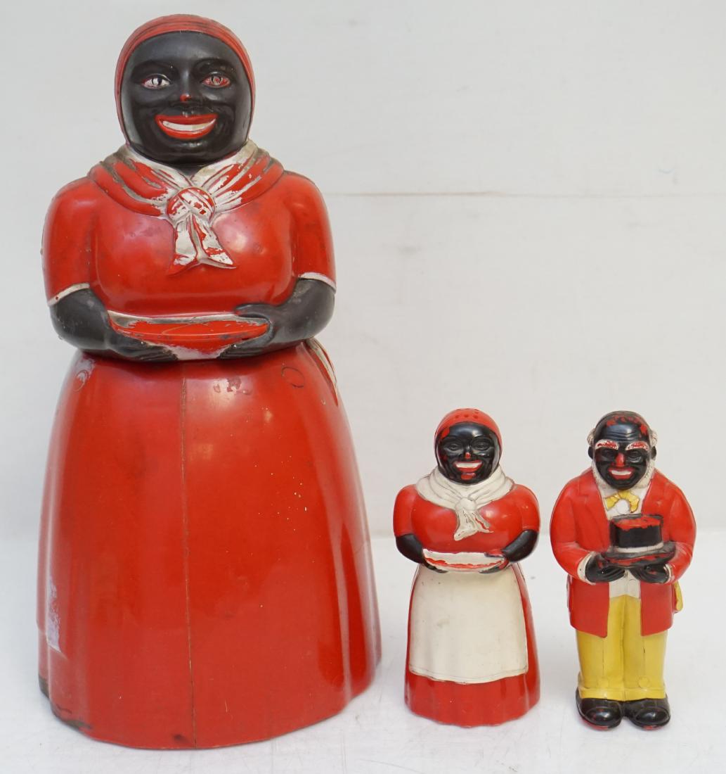 3 pc BLACK AMERICANA F&F HARD PLASTIC MAMMY COOKIE JAR: Vintage Original F&F Hold & Die Works Mammy / Aunt Jemima Hard Plastic Cookie Jar, wear to paint Measures H-11 1/2". In addition there are a Uncle Ben and Aunt Jemima Salt and Pepper Shaker Set also b