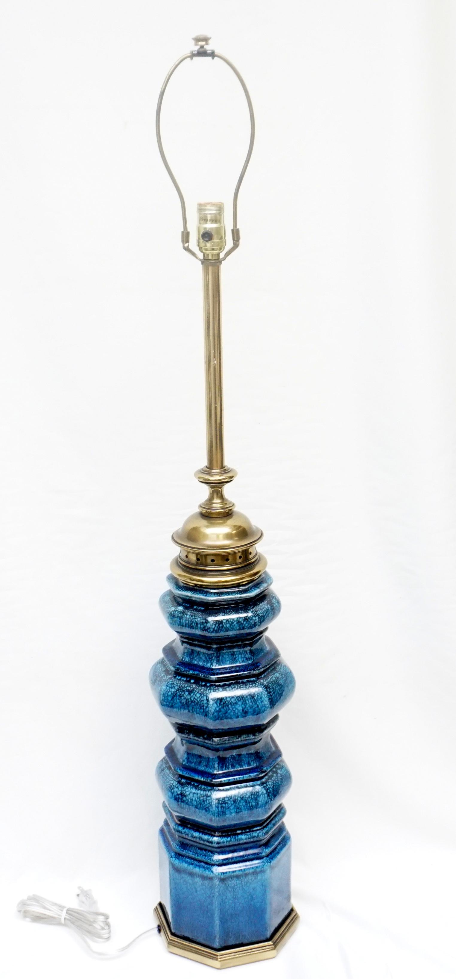 TALL STIFFEL MID CENTURY MODERN BLUE LAMP: Tall Mid Century Modern Stiffel Table Lamp. Octogonal blue pottery base with crackle glaze and polished brass. Good condition. Measures 45 1/2" to top of harp and 38 1/2" to top of fixture. Weight 15 