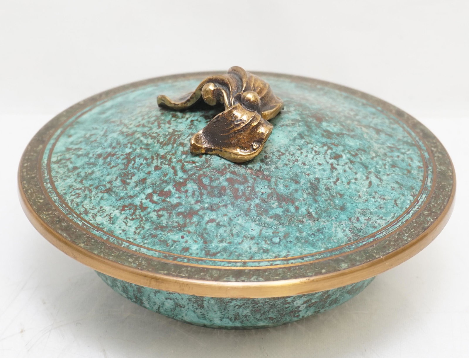CARL SORENSEN ARTS & CRAFTS BRONZE BOWL: Carl Sorensen Arts & Crafts Covered Verdigris Bronze Bowl. Measures 5 1/2"x5 1/2"x3". Weight 12 oz. Excellent condition. PROVENANCE: A Private Charleston SC Estate. Carl Sorensen was a metalworker in 