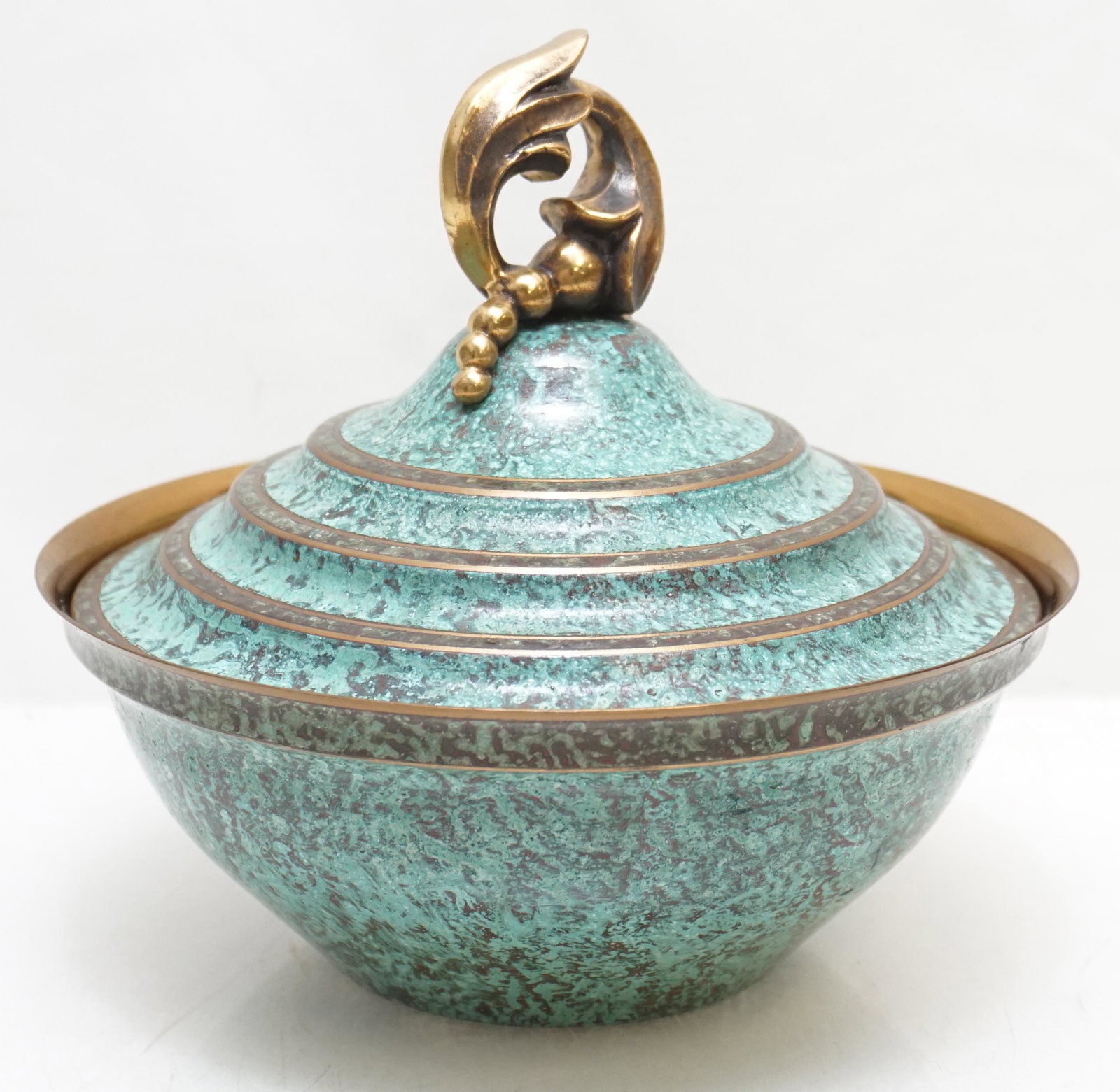 CARL SORENSEN ARTS & CRAFTS BRONZE BOWL: Carl Sorensen Arts & Crafts Covered Verdigris Bronze Bowl. Measures 7 3/4"x7 3/4"x7". Weight 1 pd 10 oz. Excellent condition. PROVENANCE: A Private Charleston SC Estate. Carl Sorensen was a metalworke