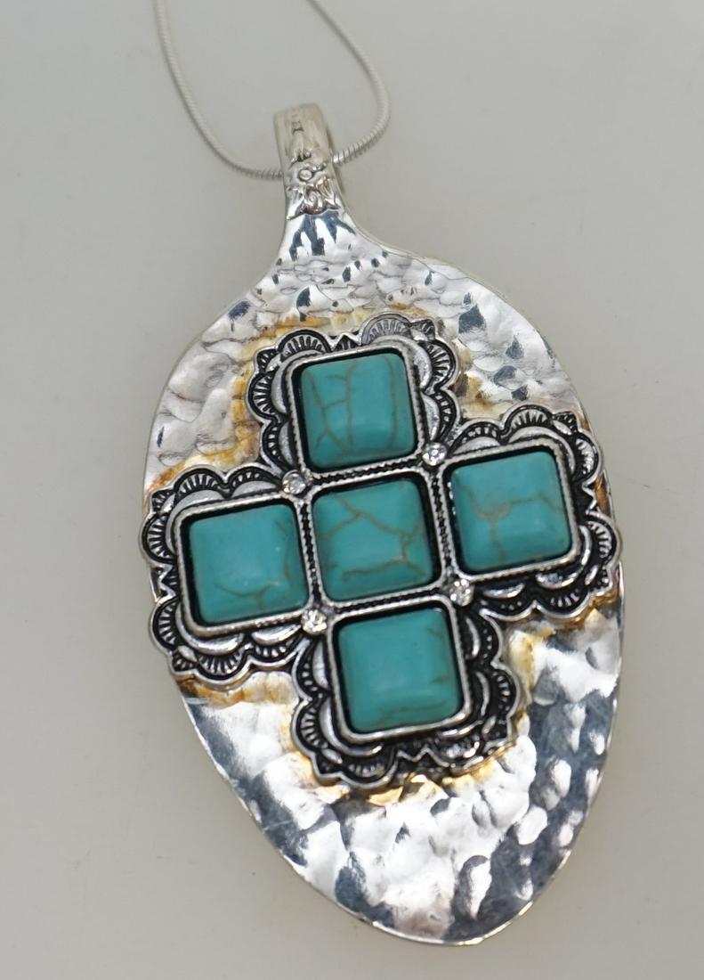 HAMMERED SPOON PENDANT STERLING CHAIN: Wm. Rogers Silver Plated hammered spoon pendant with faux turquoise on sterling silver chain. Pendant 2 3/4". Weight 1.4 oz. PROVENANCE: A Charleston SC Private Estate