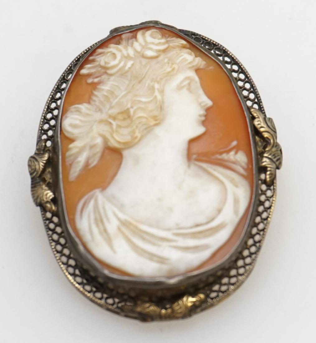 VICTORIAN CAMEO BROOCH: Antique Victorian well carved natural shell Cameo Brooch. With Flora, the greek goddess of flowers. In gold plated frame Measures 1 1/2" . PROVENANCE: A Private Charleston SC Estate
