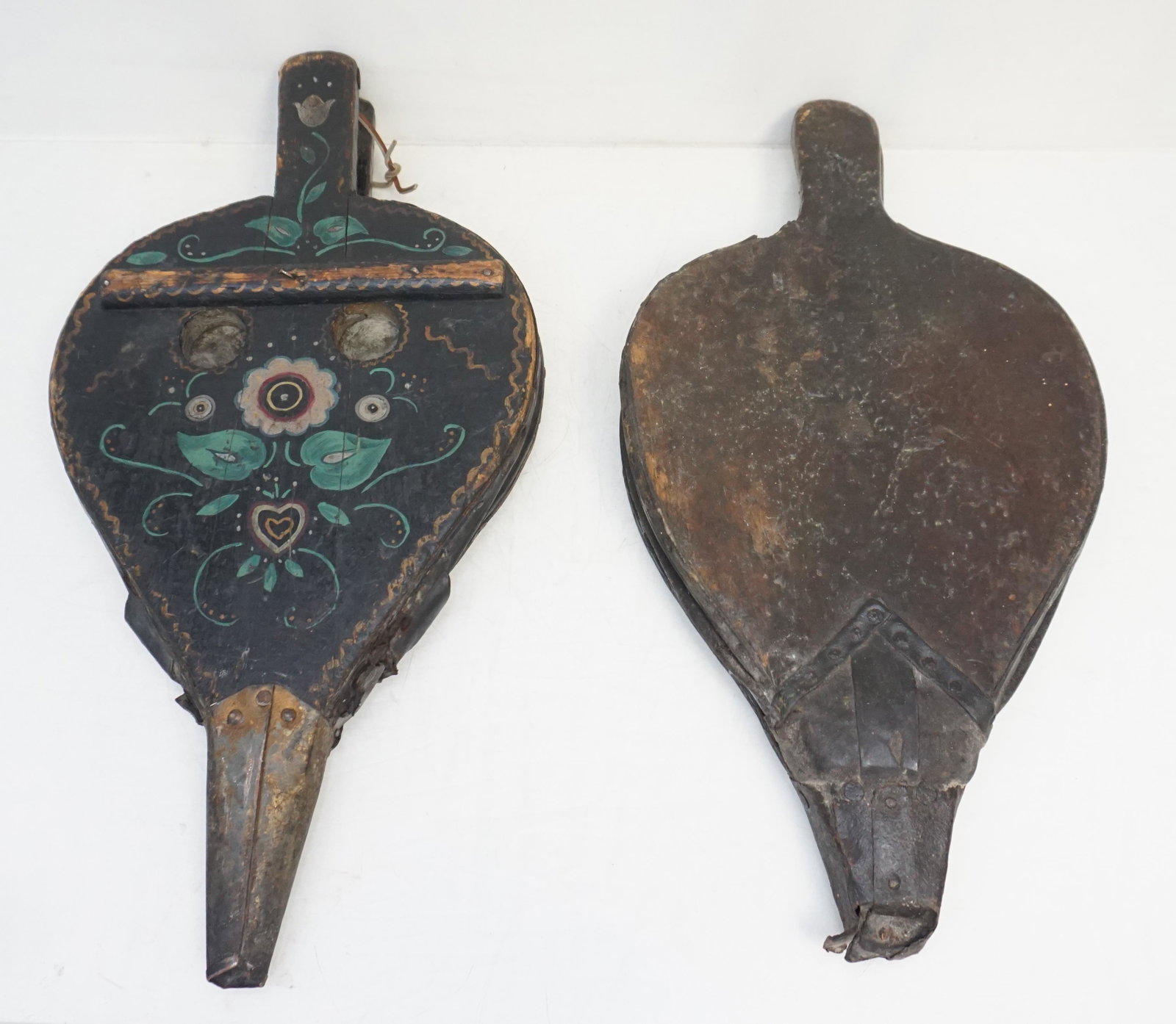 PAIR ANTIQUE WOOD BELLOWS: Two Antique Wood Bellows. One painted in Pennsylvania Dutch Style. Longest 19 1.2". Weight combined 5 pds 4 oz. PROVENANCE: A Private Charleston SC Estate.