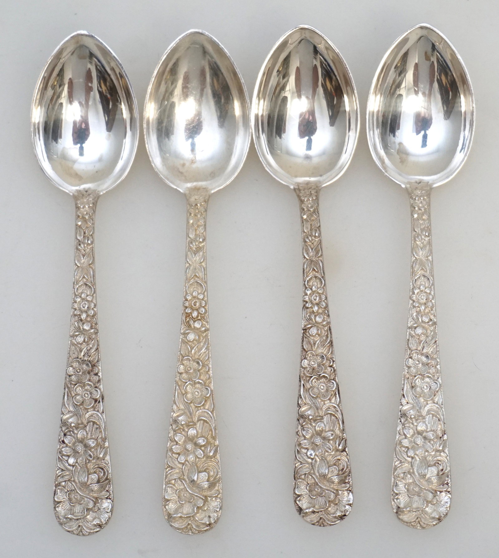 4 STERLING REPOUSSE S. KIRK AND SON DEMITASSE SPOONS: 4 Sterling Silver Demitasse Spoons in the Repousse pattern by S. Kirk and Son (now, Kirk-Stieff), Baltimore, Maryland. No monograms. Repousse was introduced into America by Samuel Kirk in 1828. This i