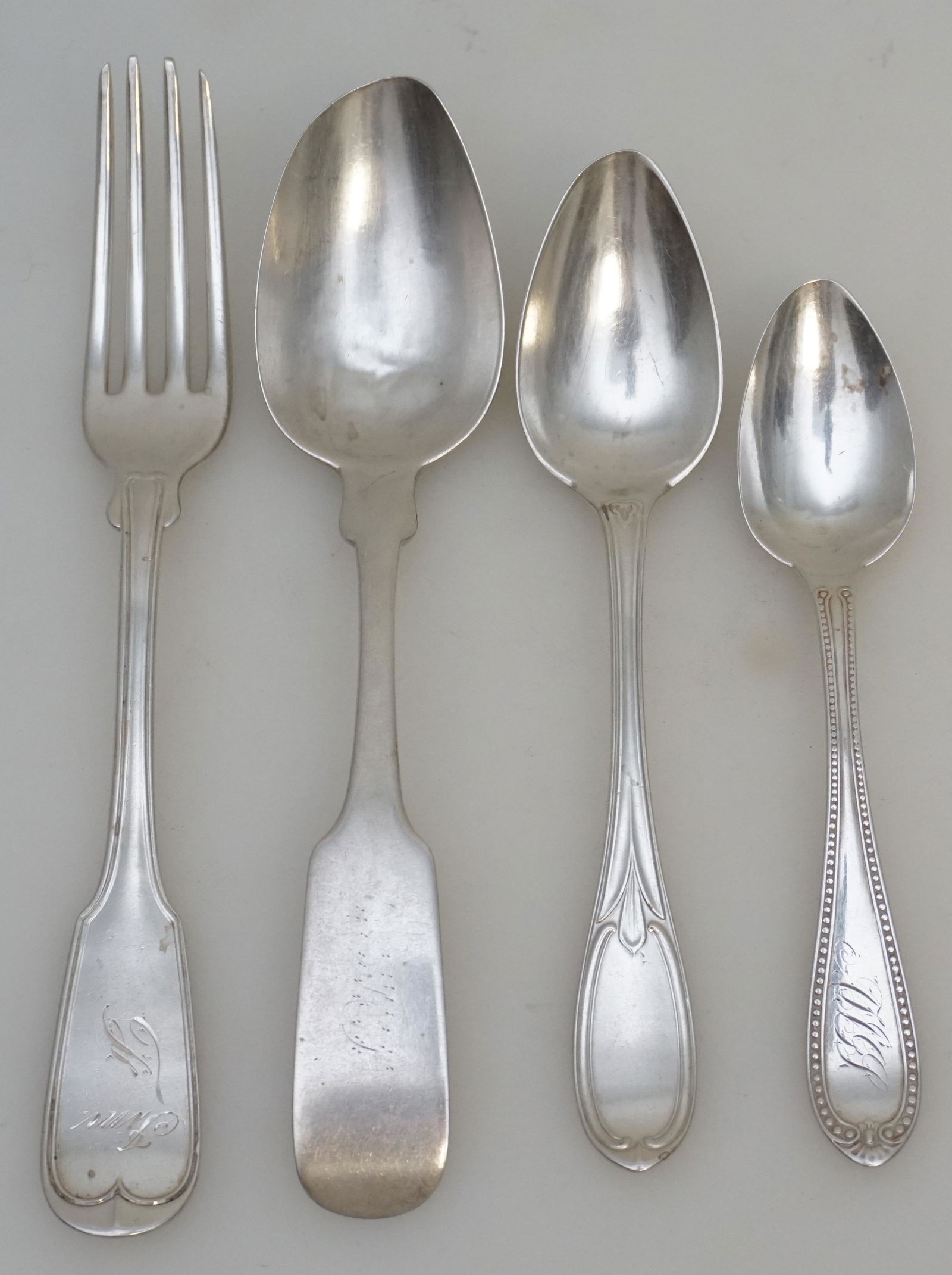 4 PC AMERICAN COIN SILVER CHARLESTON: American Coin Silver 3 From Charleston SC. 1- Fork John Ewan, Charleston, SC 1823-1852. Monogrammed 8 1/4". 2- Spoon Wood & Hughs, New York New York, NY 1845-1899. Monogrammed 7 2/8". 3- Teaspoon Will