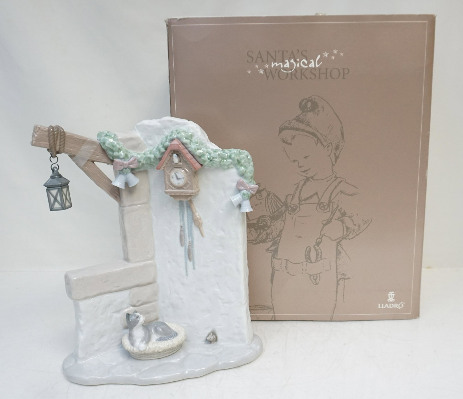 LLADRO PORCELAIN IT'S ALMOST TIME: Lladro Santas Magical Workshop "It's Almost Time" #6895 Porcelain Figure. Sculptor Joan Coderch. With original box. Figure measures - 11" high x 9 1/2" wide. In box 15 1/2"x13"x7 1/2". Weight 7 pds. P