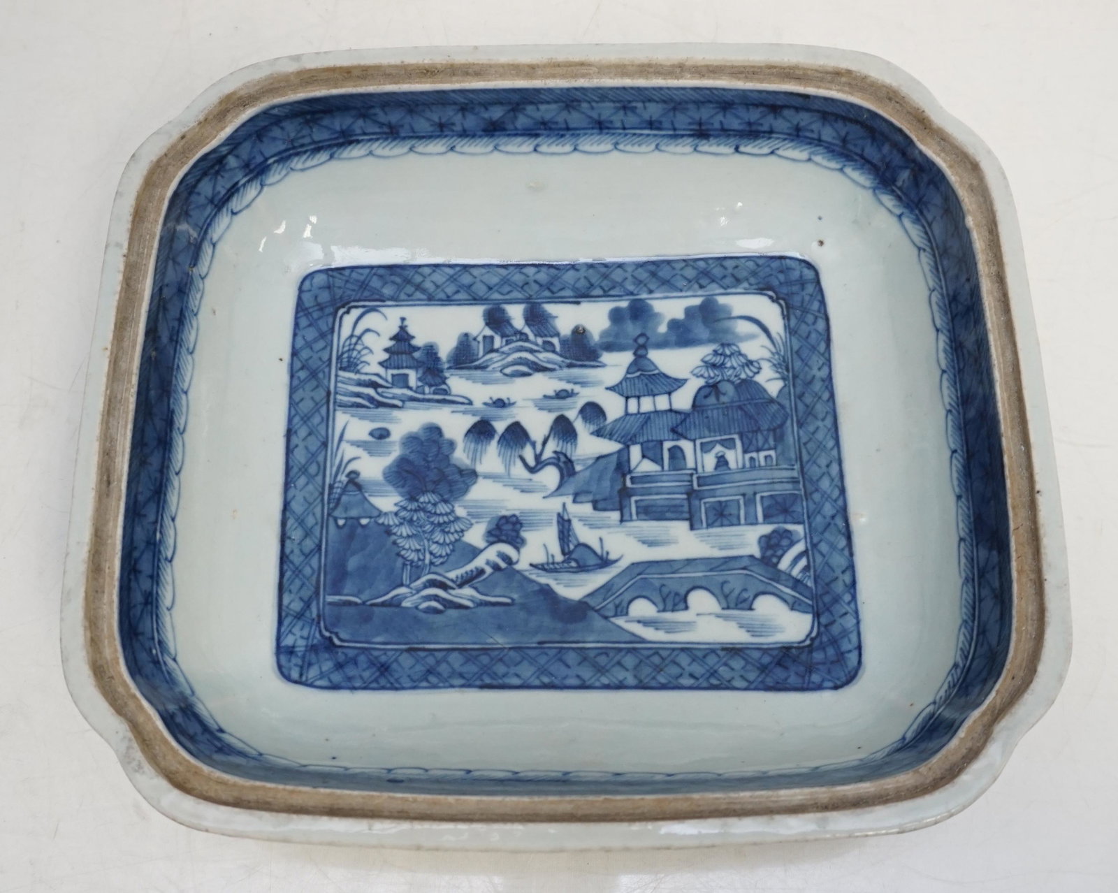 IMPORTANT CHINESE BLUE CANTON BOWL: Chinese Export 19th c. Early Blue and White Canton Lobed Rectangular Bowl. 9 3/4"x8 3/4"x2 1/2". From the collection of Dr. Fraser Wilson of Charleston, SC. Dr. Wilson's Blue Canton collection was so 