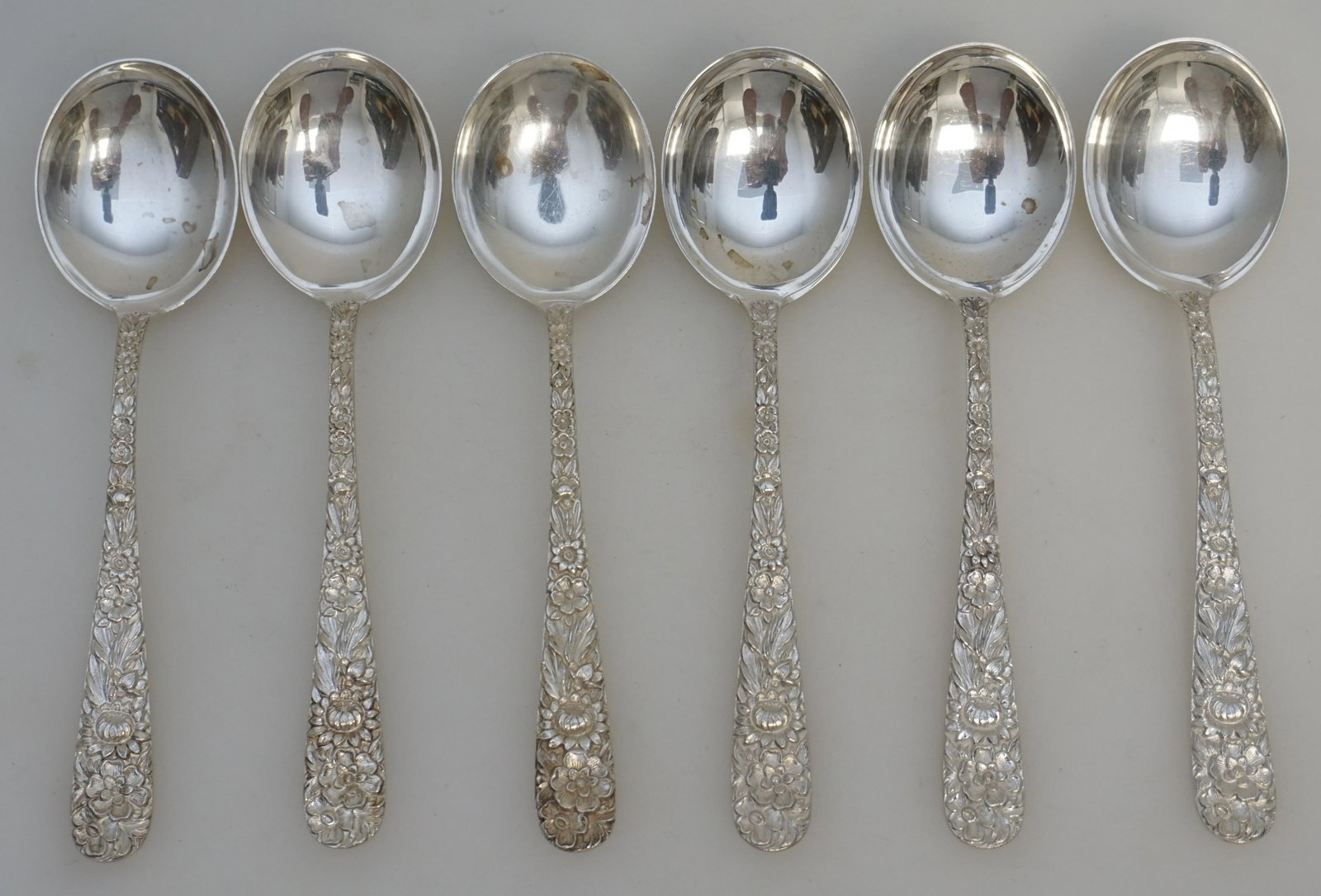 6 STERLING REPOUSSE S. KIRK AND SON SOUP SPOONS: 6 Sterling Silver Soup Spoons Round Bowl in the Repousse pattern by S. Kirk and Son (now, Kirk-Stieff), Baltimore, Maryland. No monograms. Repousse was introduced into America by Samuel Kirk in 1828. 