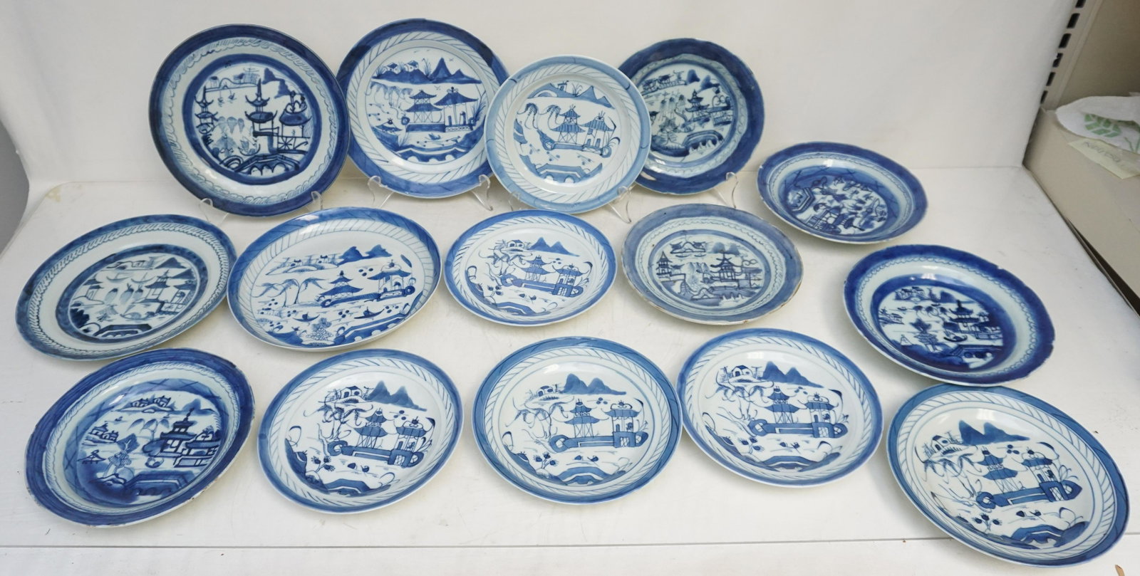 15 PC 19th c. CHINESE BLUE CANTON PLATES: Fifteen (15) Piece Chinese Export Blue and White Canton Plates and Bowls. Varied. Sizes from 7 3/4" to 8 3/4// Weight 3 pds. From the collection of Dr. Fraser Wilson of Charleston, SC. Dr. Wilson's Bl