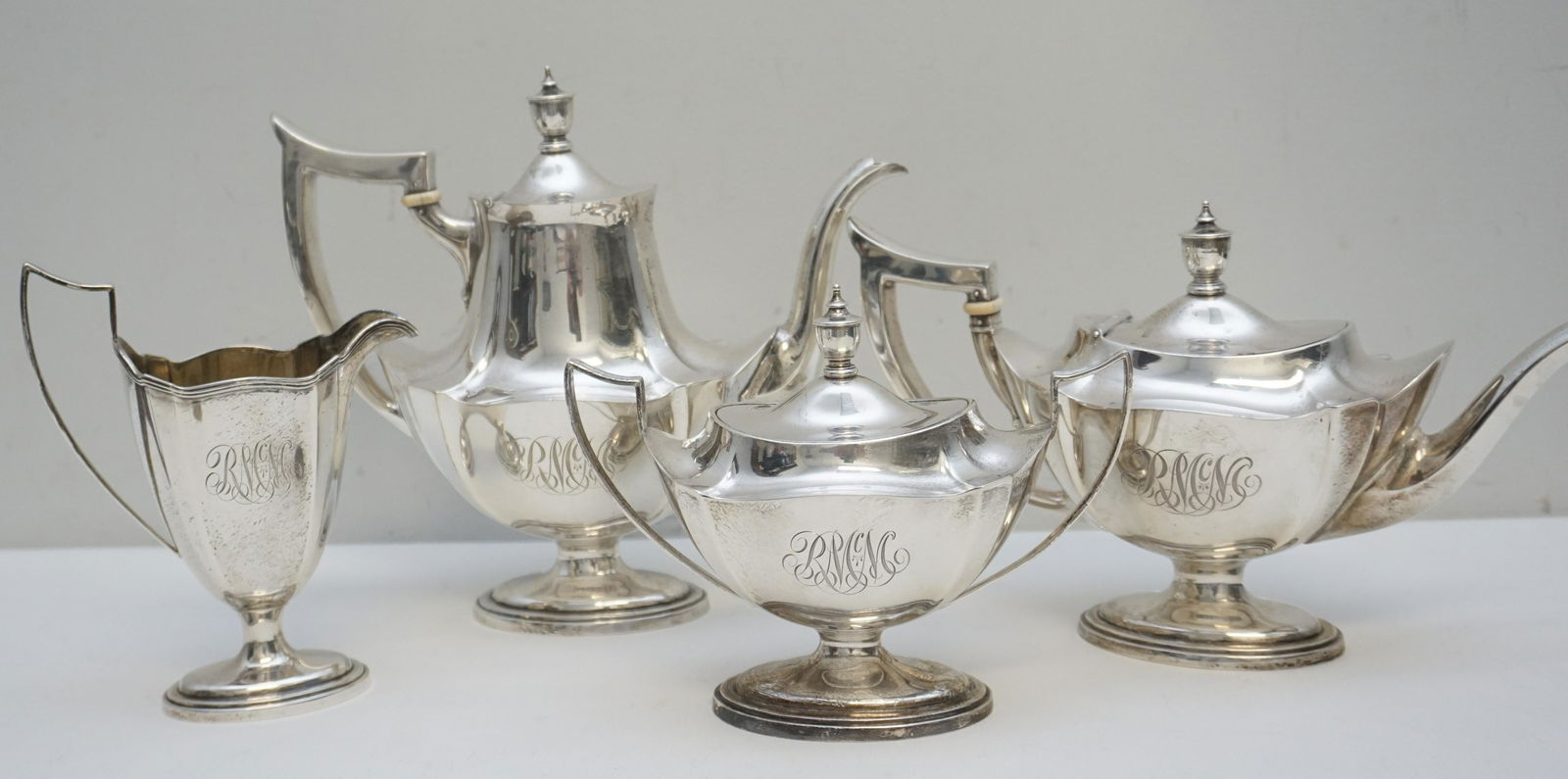 4 PC GORHAM STERLING PLYMOUTH COFFEE SERVICE: Four Piece Gorham Sterling Silver Tea and Coffee Service c. 1911. Set consisting of teapot (A2412/10, 1 1/4 pints, 6 1/8"t.), coffee pot (A2411/16, 1 3/4 pints, 8 1/4"t.), covered sugar bowl (A2413/16