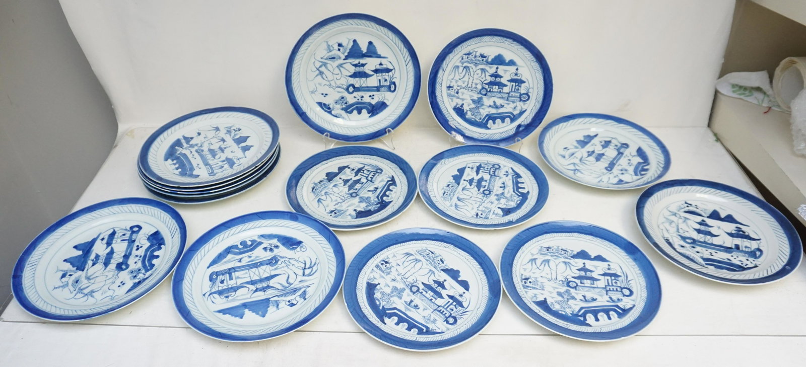 15 PC 19th c. CHINESE BLUE CANTON PLATES: Fifteen (15) Piece Chinese Export Blue and White Canton Plates and Bowls. Varied. Sizes from 9 1/4" to10 1/4. Weight 17 pds. From the collection of Dr. Fraser Wilson of Charleston, SC. Dr. Wilson's Bl