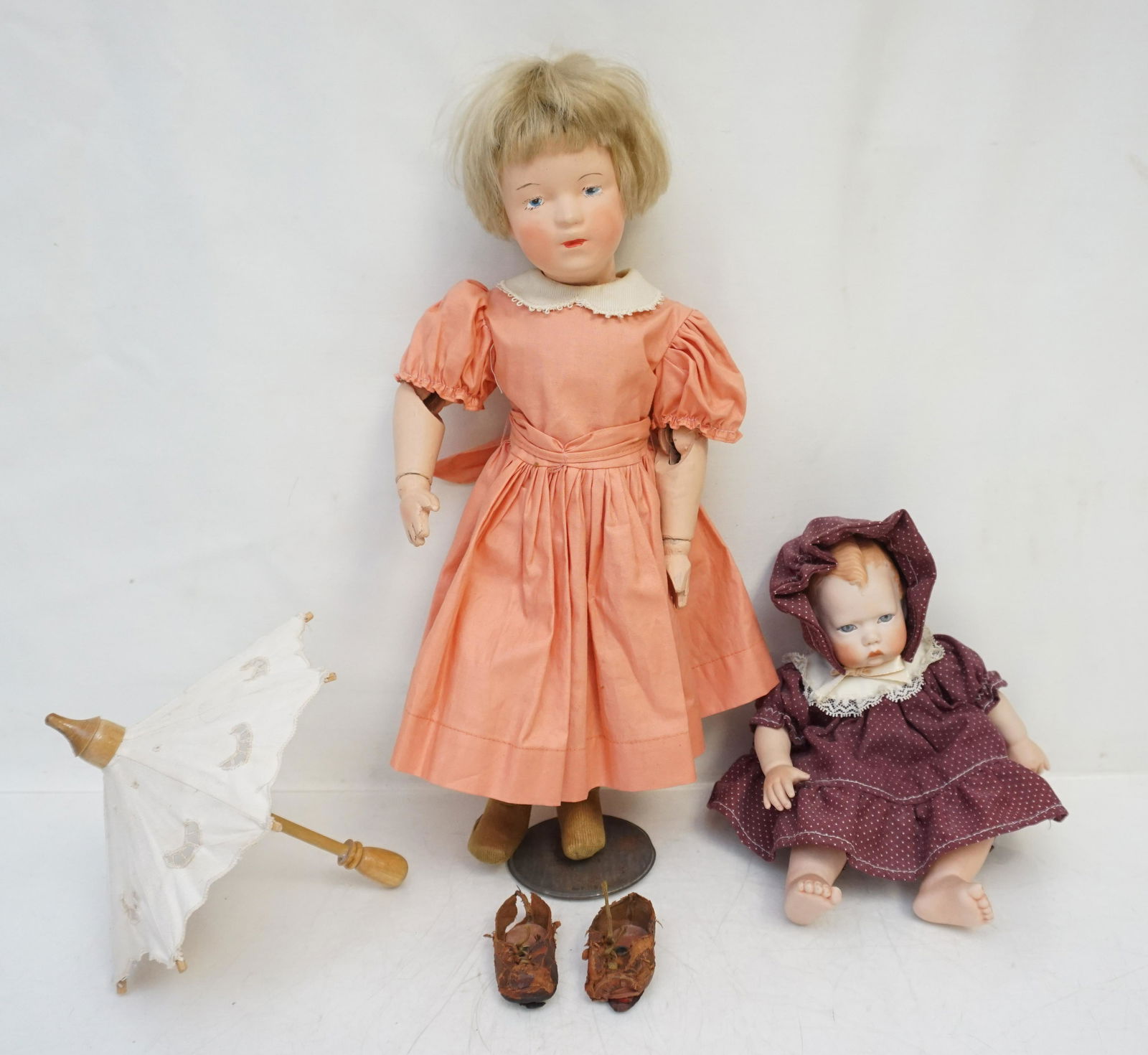 SCHOENHUT 1911 WOOD DOLL 15 INCH +: Antique Albert Schoenhut & Company 1872-1935 Bent Limbed Wood Doll 15" made c. 1911. Good condition, minor wear. On original stand with original shoes, factory holes in shoes and feet to place on stan
