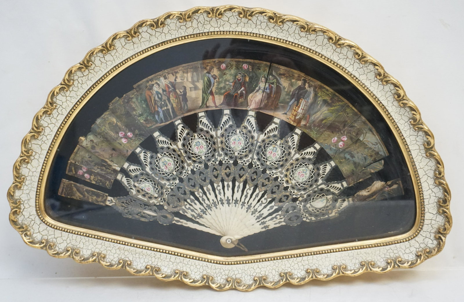 FRAMED ANTIQUE HAND PAINTED FAN: Antique Hand Painted Framed Fan from Spain. In gilt and painted Shadow Box Frame. 22"x14"x2 1/2". Weight 5 pds.
