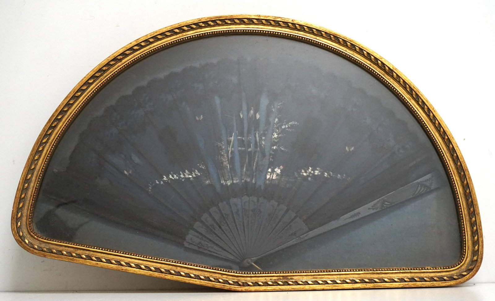 FRAMED ANTIQUE HAND PAINTED FAN: Antique Hand Painted Framed Fan from Spain. In gilt wood Shadowbox Frame. 27 1/2"x17"x2". Weight 5 pds. PROVENANCE: A Private Charleston SC Estate.