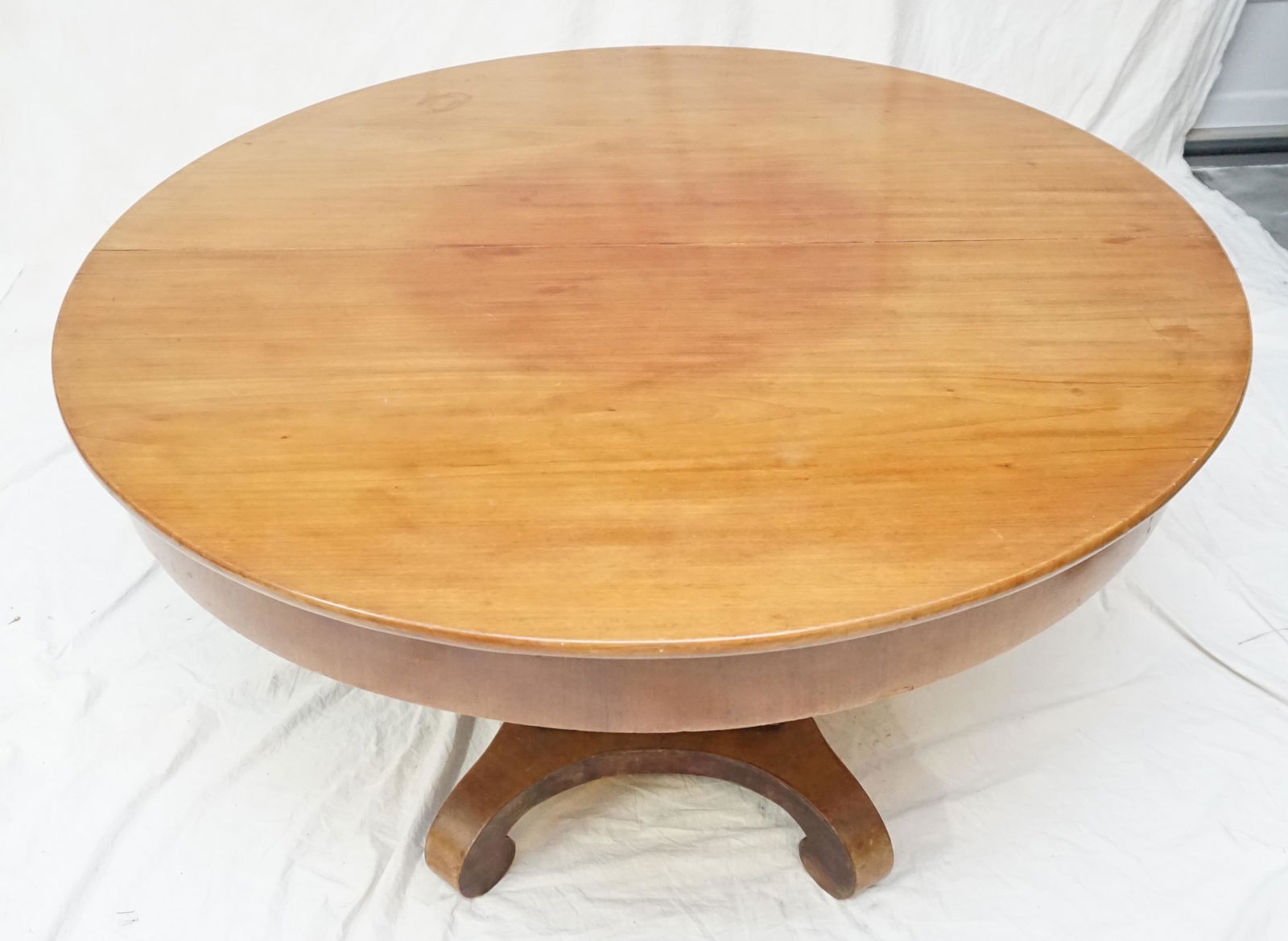 19th c BIEDERMEIER DINING TABLE: Antique Biedermeier Fruitwood Pedestal Dining Table 19th c. with 3 Leaves. All of the leaves are different colors and have some wear. Purchases in Vienna. Measures 40.5" w ( w/ all leaves) 111" w/o 4