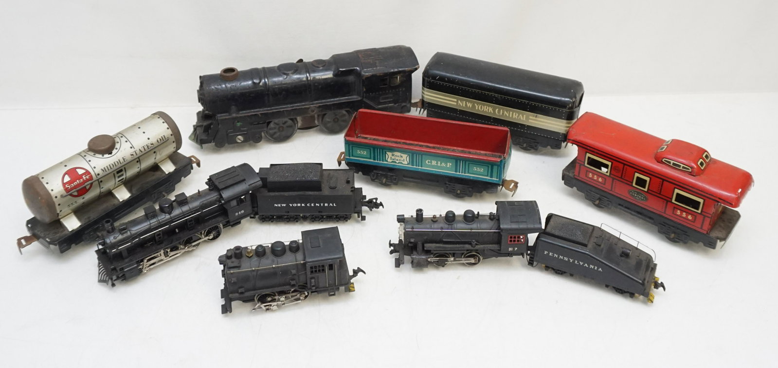 LOT OF VINTAGE HO TRAINS MARX- FLEISCHMANN: 1- Fleischmann New York Central #246 AC Steam Locomotive and Tender. 2- Mantua Ho Scale Locomotive & Pennsylvania Coal Tender. 3- 4 Piece Vintage Mark Mar Tin Litho Train Cars including Caboose. 4- Ri
