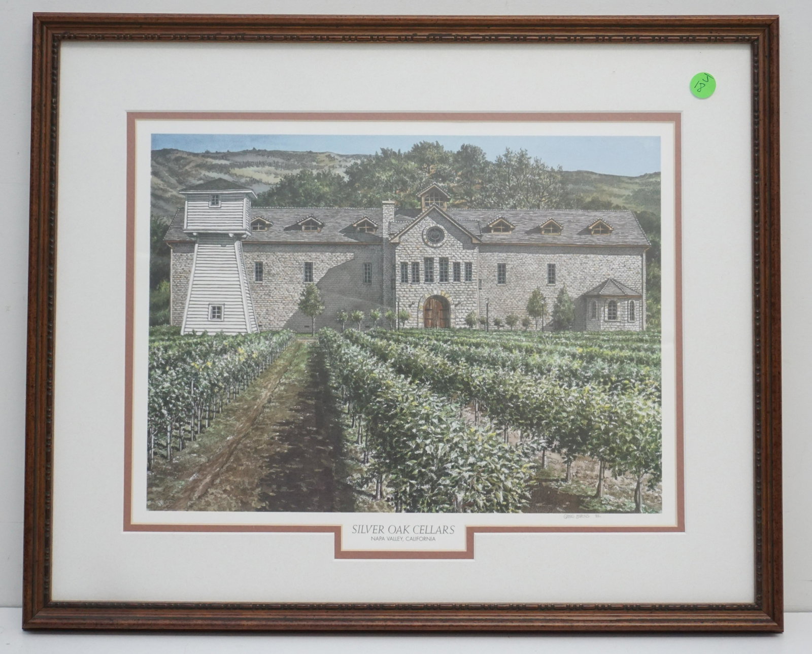 SILVER OAK CELLARS LITHO: Framed Silver Oak Cellars Winery Litho signed by the artist Greg Burns and dated 1995. Features the Watchtower that appears on their Label that was destroyed in a 2006 fire. Professionally framed and 