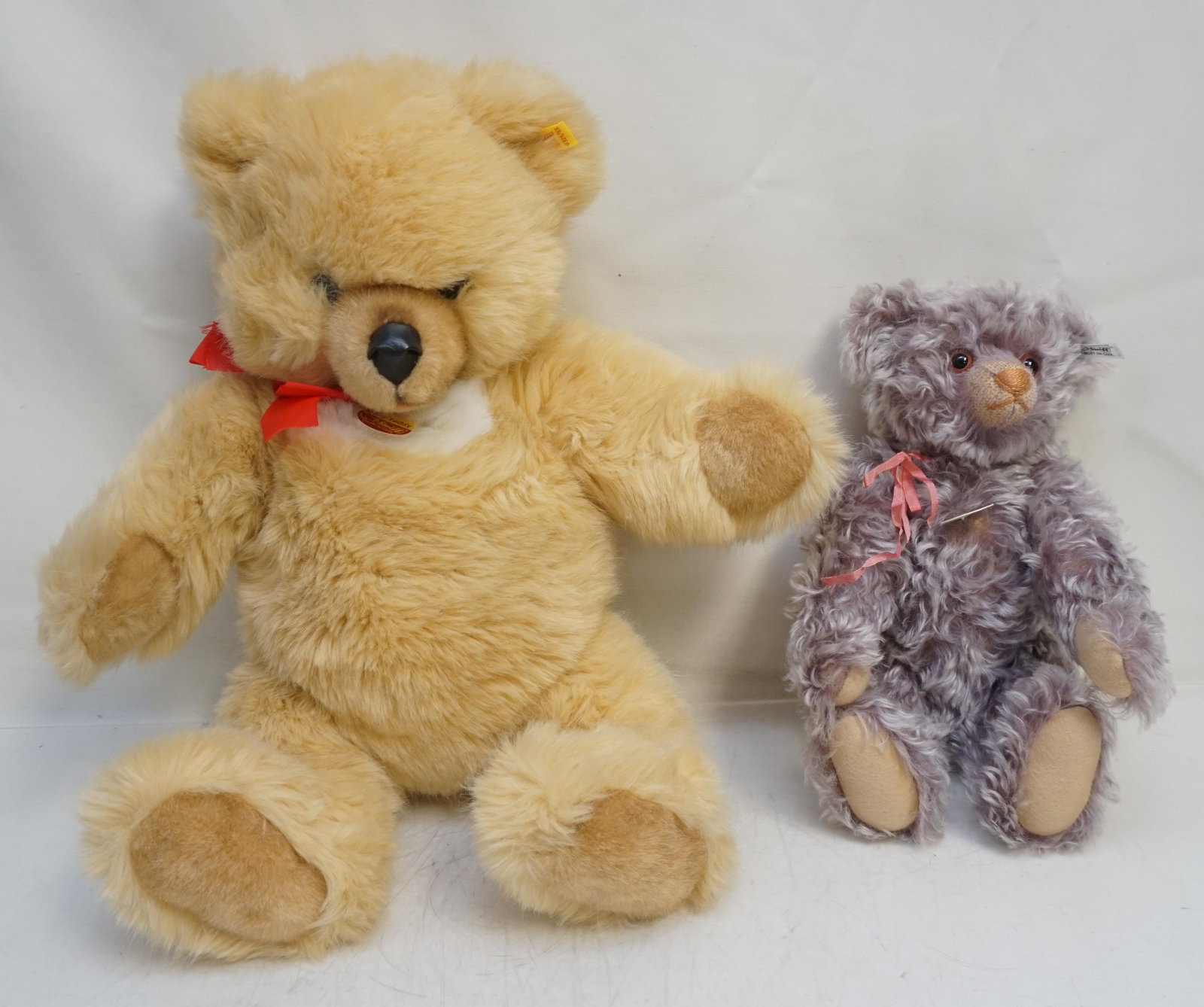2 STEIFF MOHAIR TEDDY BEARS: 2 Steiff Mohair Teddy Bears with Tags and Buttons. In good condition. 1- Steiff Original Molly Bear Large 22 1/2". 2- Steiff 1925 Replica Violet Bear 14". Weight on all 2 pds.PROVENANCE: A Private Cha