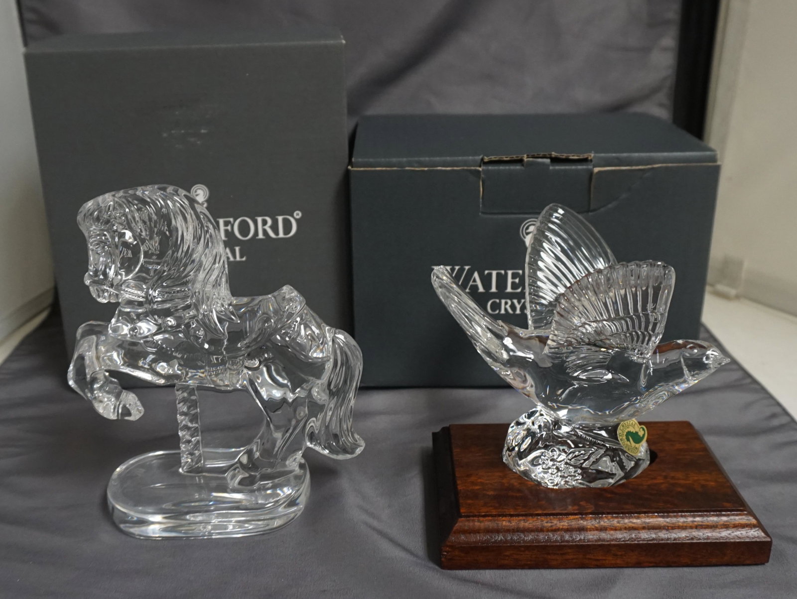 2 PC WATERFORD CRYSTAL NIGHTINGALE + CAROUSEL HORSE: All with the acid etched mark and all in the Original Boxes. 1- Waterford Crystal Collectors Society Legend & Lore Nightingale Bird 4 3/4" in the original box with wood stand. 2- Waterford Crystal Col