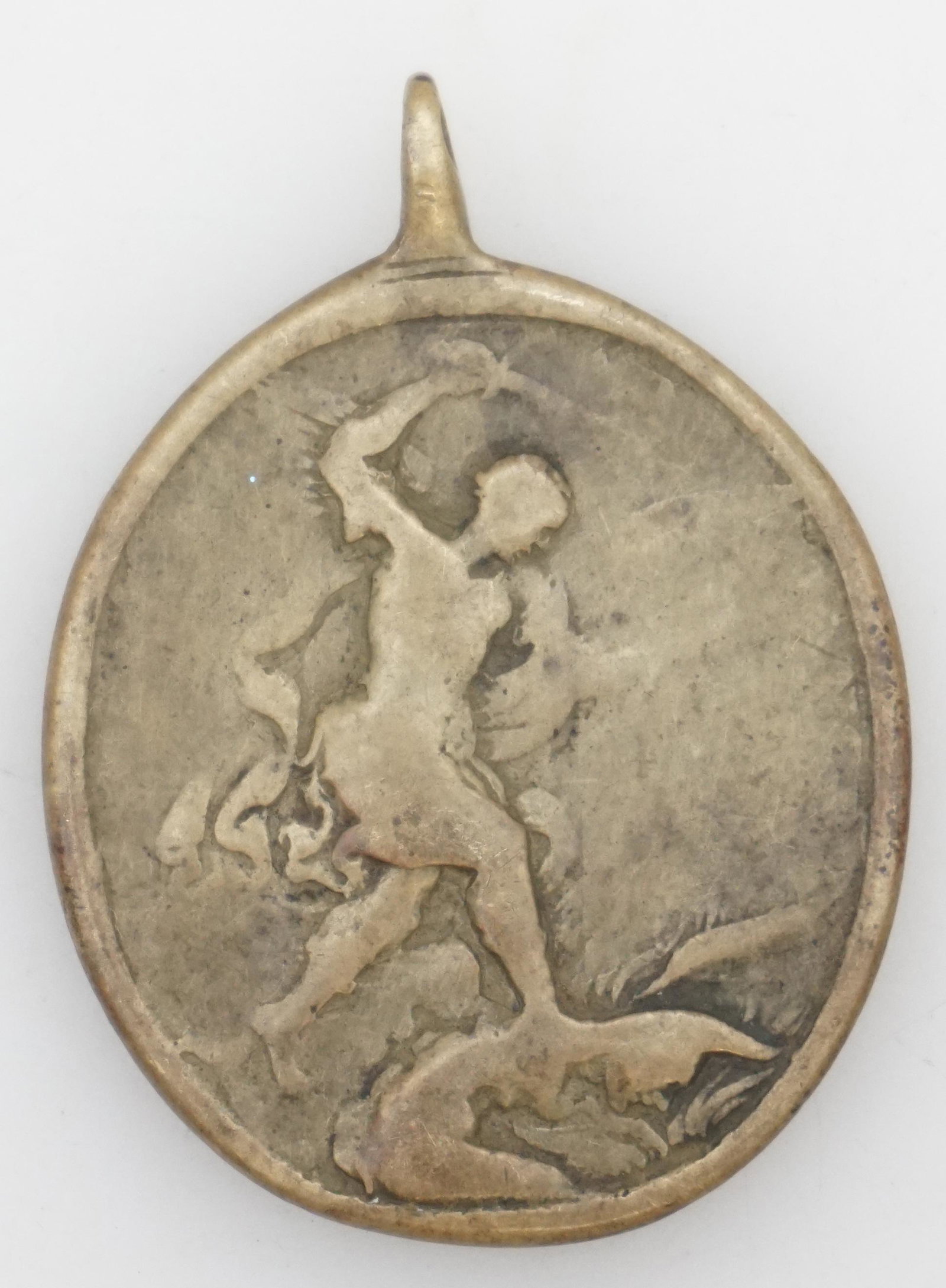 ANTIQUE BRONZE OUR LADY OF SORROWS MEDALLION: Antique 18th c. French Catholic Bronze Medallion Our Lady of Sorrows. The Virgin Mary is depicted with seven swords in her heart, a reference to the prophecy of Simeon at the Presentation of Jesus at 