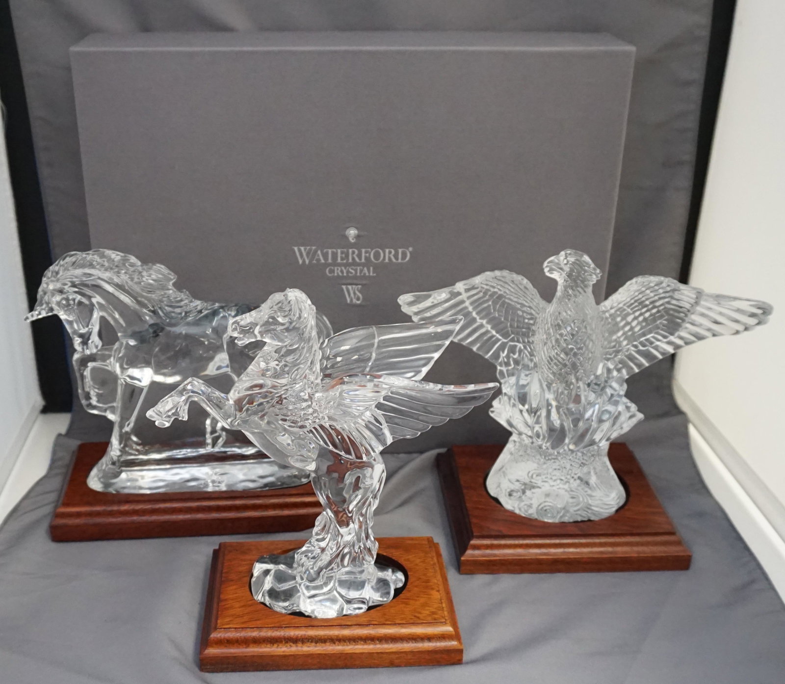 3 WATERFORD PEGASUS - UNICORN - PHOENIX: 3 Pieces of Waterford Crystal from the Legends and Lore Collection, Waterford Collectors Society. All in excellent condition, all in boxes, all with wood stands. 1- 1999 Pegasus 7 1/4" tall. 2- 2000 P