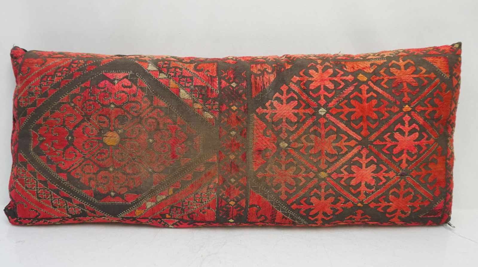 ANTIQUE MOROCCAN KILIM SADDLE BAG PILLOW: Antique Moroccan Kilim Saddle Bag Pillow. Some wear. 28 1/2"x10 1/2"x3 1/2". Weight 2 pds. PROVENANCE: A Private Charleston SC Estate.