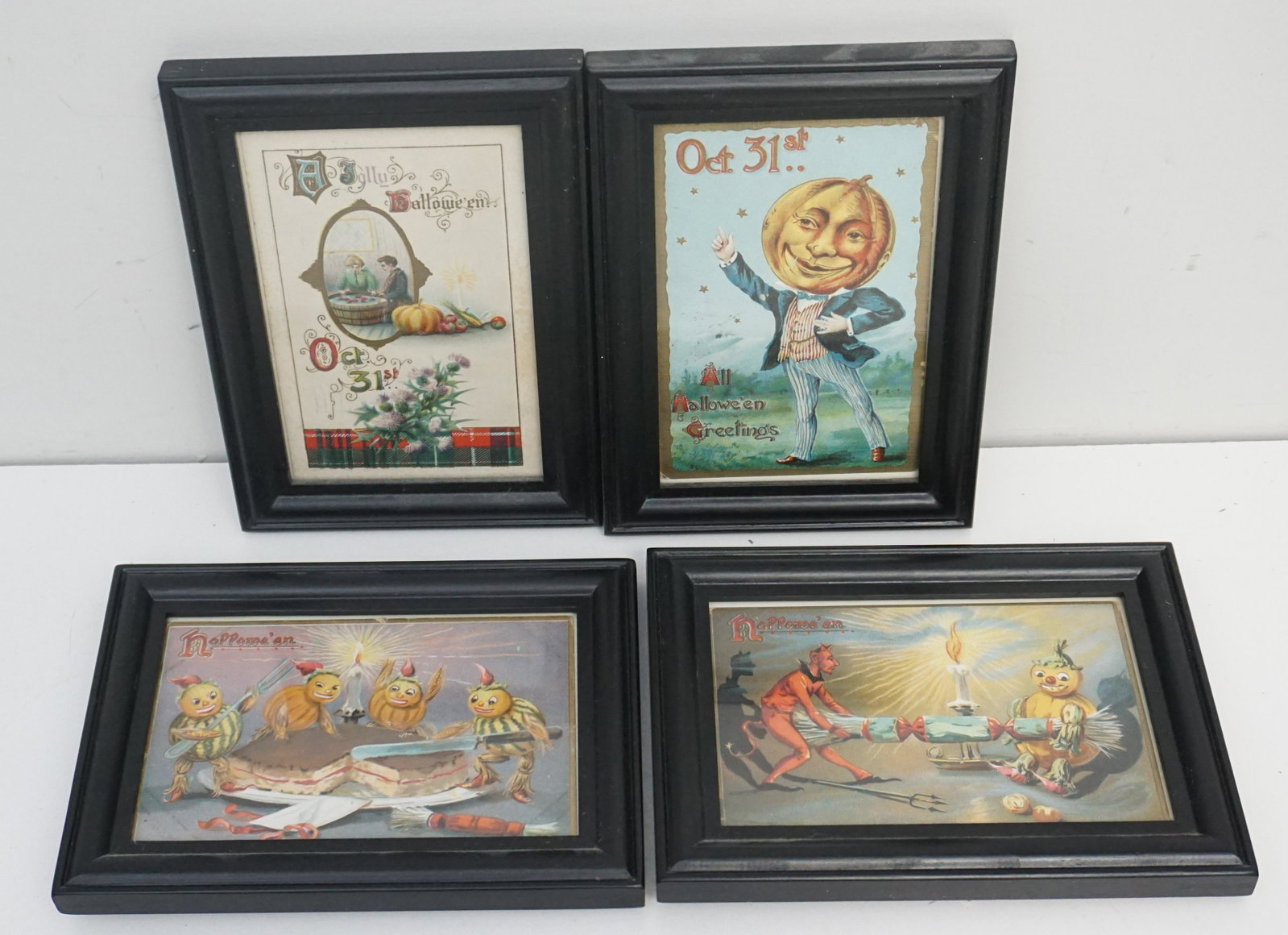 4 FRAMED HALLOWEEN POSTCARDS: Four framed Quality Antique / Vintage Halloween Postcards. Early 20th c. All in matching black frames. In frames 7 1/4"x5 1/4". Weight 1 pd 4 oz. PROVENANCE: A Charleston SC Private Estate
