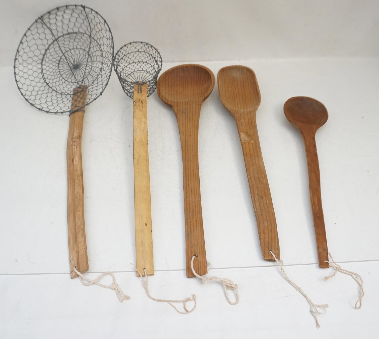 5 PC AMERICAN PRIMITIVE KITCHEN UTENSILS: Set of 5 Antique American Primitive Wooden Kitchen Utensils. All 14-20" long. Weight on all 1 pd 6 oz. PROVENANCE: A Private Charleston SC Estate.