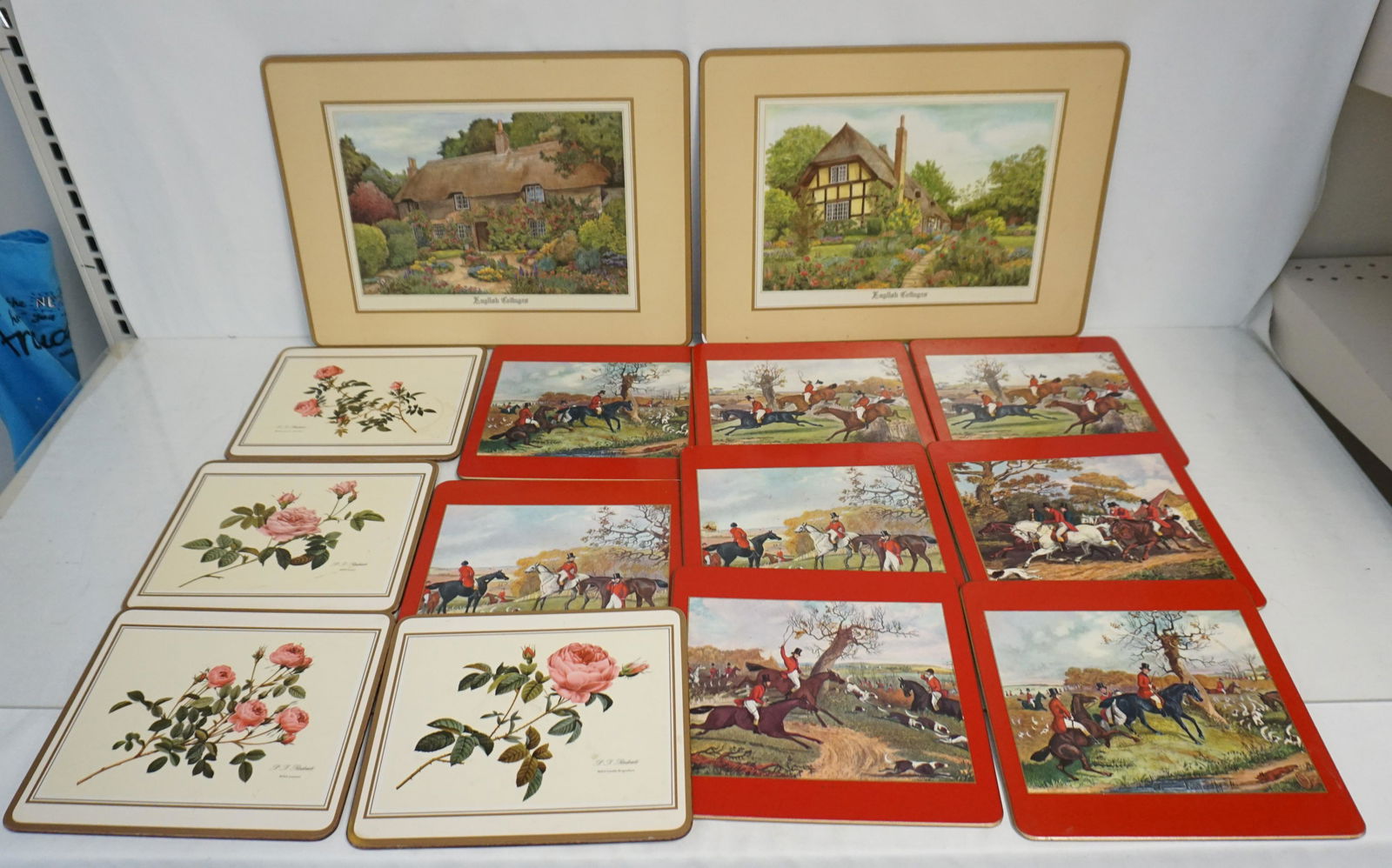 14 ENGLISH CORK BACK PLACEMATS + TRIVETS: 14 English Cork Back Placemats and Hot Plate Trivets. 2 Placemats 15 3/4 and 12 Trivets 4 are flower and 8 are Hunt Themed all 8 3/4". Weight on all 3 pds 11 oz