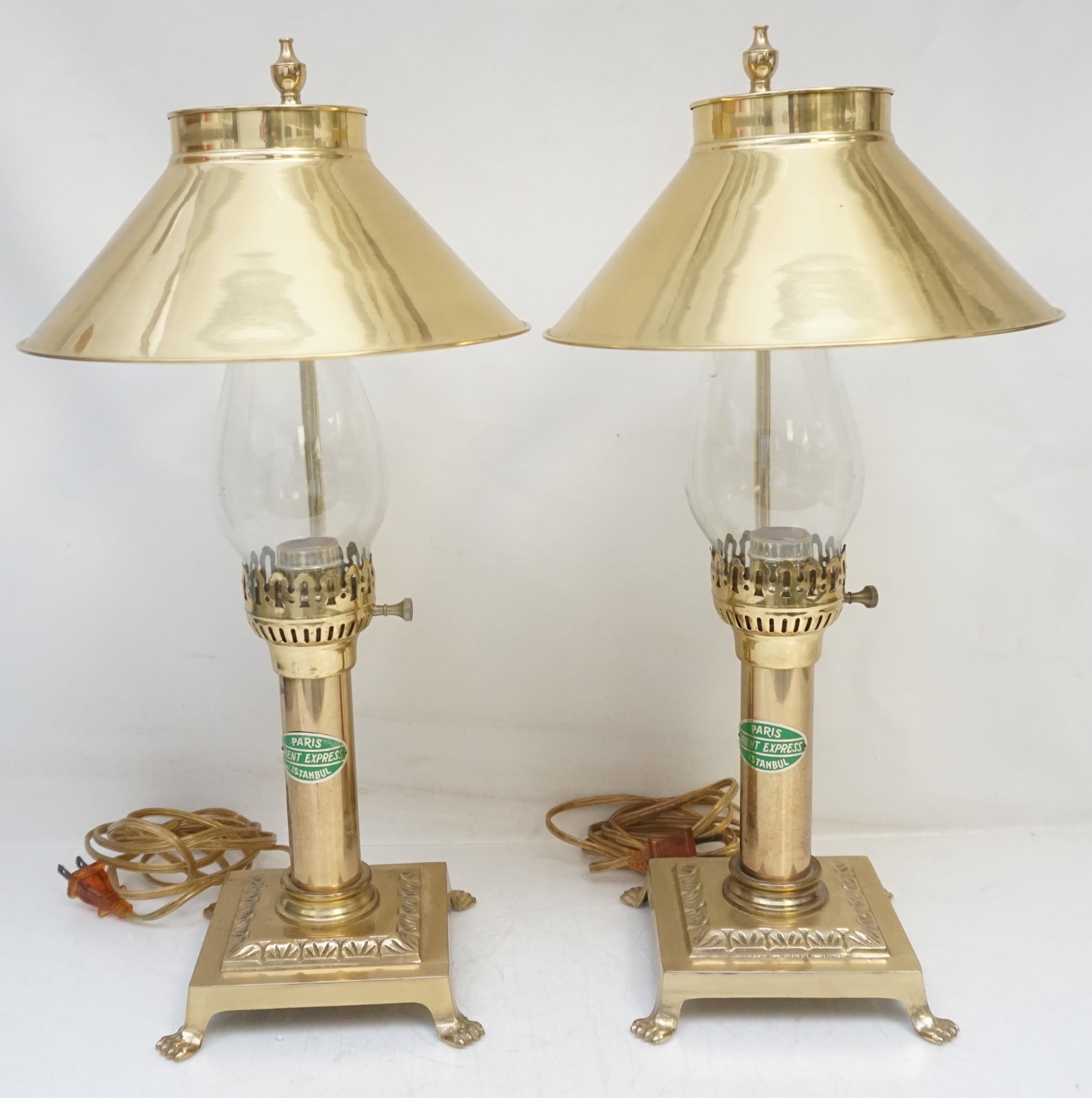 PAIR BRASS ORIENT EXPRESS LAMPS: Matched Pair of Vintage Brass Paris Orient Express Istanbul Desk / Table Lamps.Glass Chimney 1970s. Each 20" to top of finials. Weight combined 4 pds 10 oz. PROVENANCE: A Private Charleston SC Estate