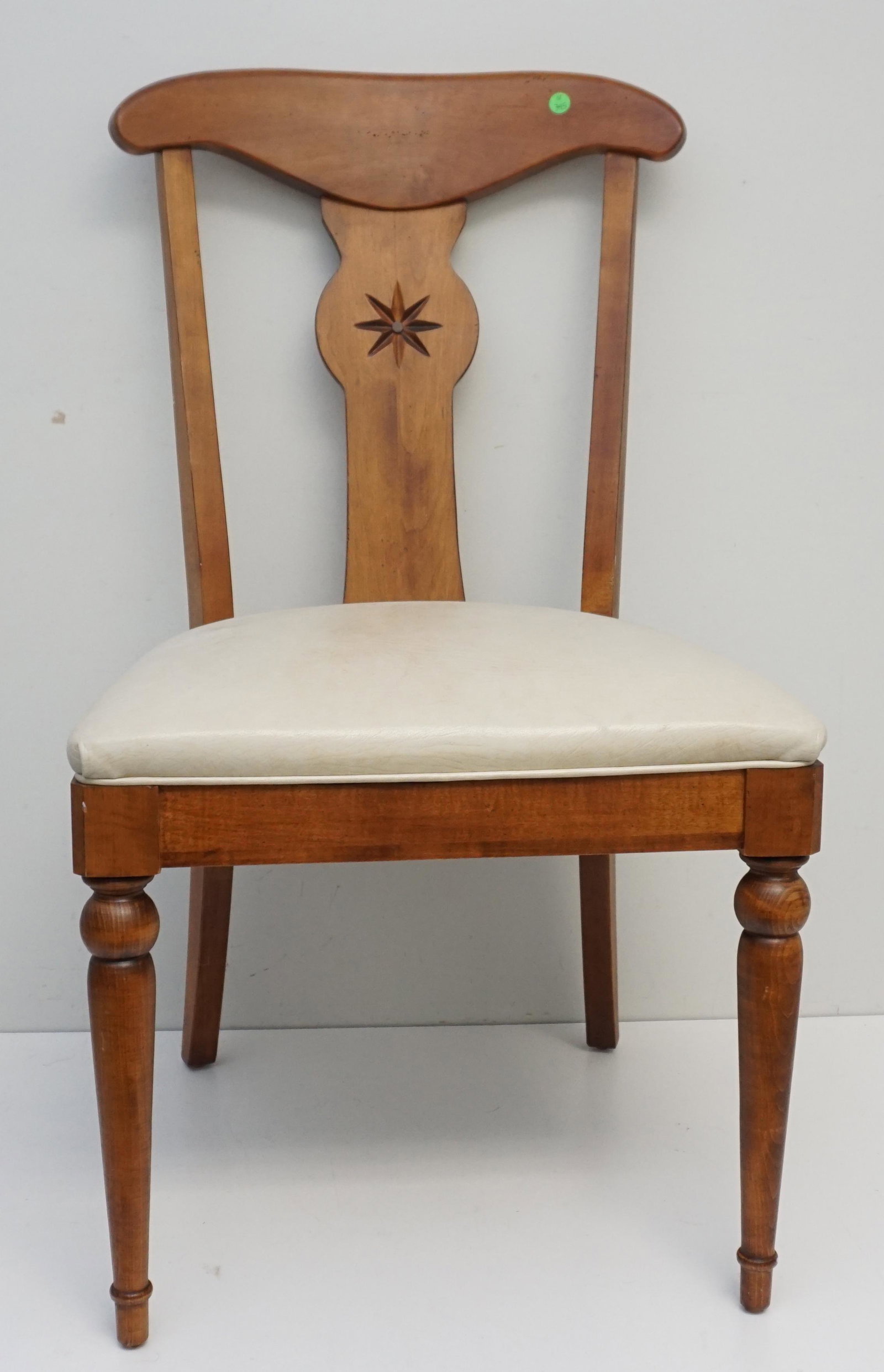 ETHAN ALLEN CHERRY SIDE CHAIR: Contemporary Traditional Ethan Allen Side Chair. Solid Hardwood in a aged Cherry finish, , featuring a carved medallion design. Measures 20"x18"x37. ***Pickup only or Shipping on this item offered thr