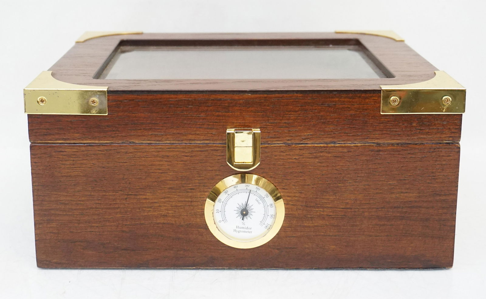 SPANISH CEDAR HUMIDOR NEW: Cherry Finish Spanish Cedar Humidor. New and Unused. With all Paperwork. No Box. Measures 10 1/2"x9"x4 3/4", Weight 4 pds 7 oz. PROVENANCE: A Private Charleston SC Estate.