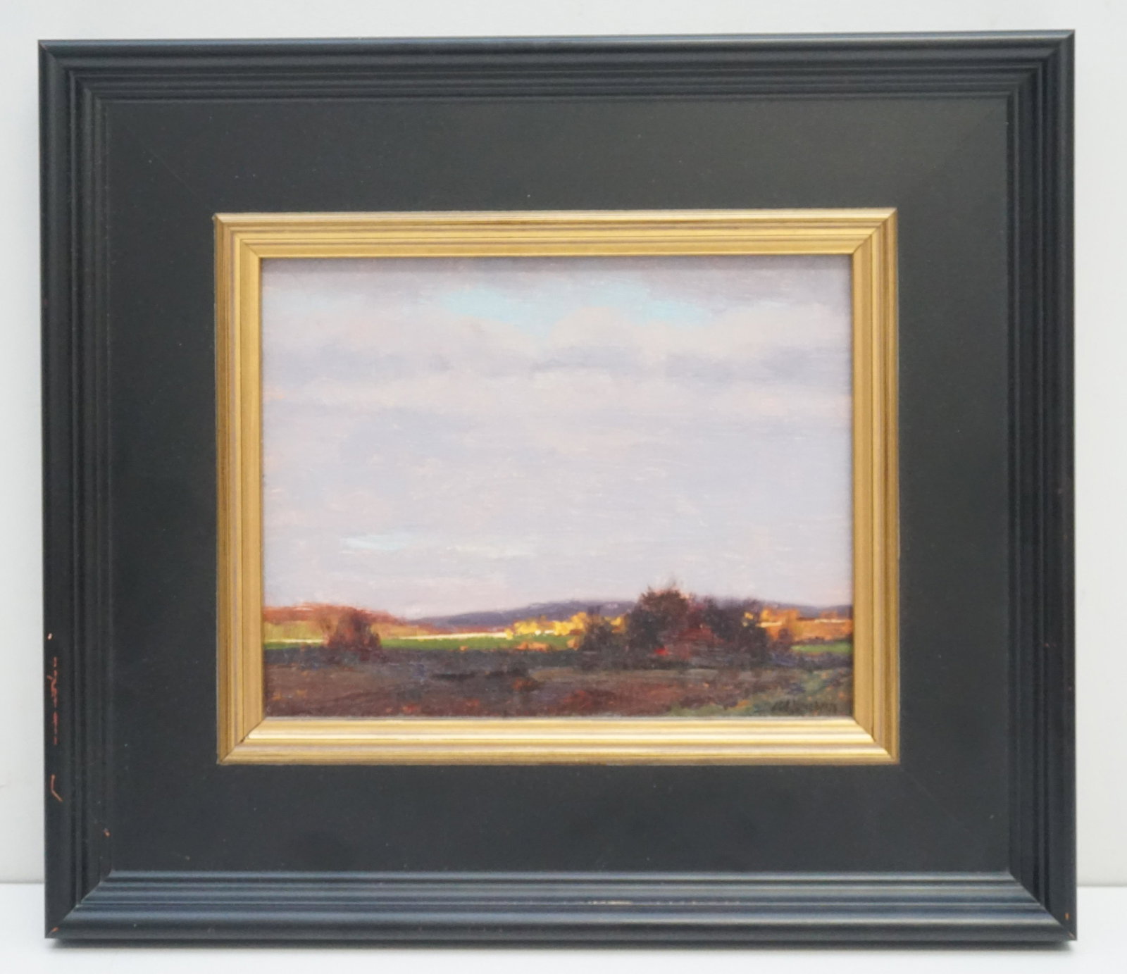 MARC HANSON OIL LANDSCAPE: Marc Hanson Oil on Canvas "Sliver of Light", signed lower left.. Oil 8"x10". In Black frame with gilt molding 14"x17"x1 1/2". Weight 3 pds 10 oz. PROVENANCE: A Private Charleston SC Estate. Having gro