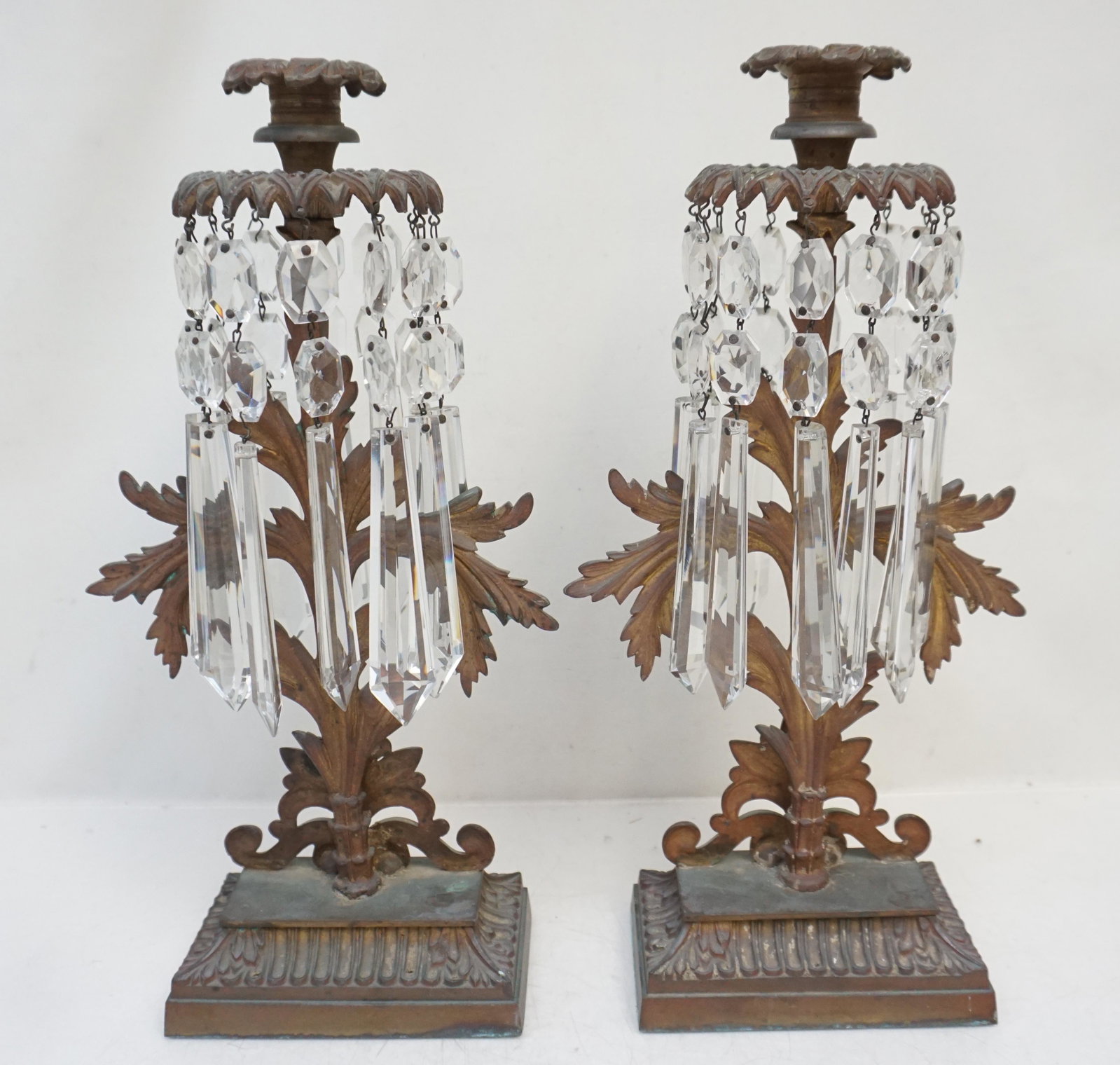 PAIR GIRANDOLE CANDLES: Matched Pair of Antique Girandole Candles with Prisms. Measures 7"x4"x14". Weight 8 pds 10 oz. PROVENANCE: The Estate of Dr. Fraser Wilson, Charleston SC. Dr. Wilson will be remembered for his love of