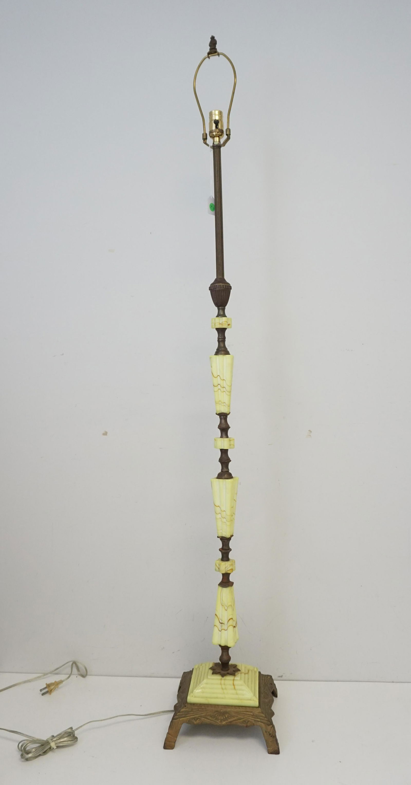 ART DECO VASELINE FLOOR LAMP: Art Deco Houze Vaseline Slag Good condition. 14 pds. Glass Floor Lamp. Measures 55 3/4" without harp. PROVENANCE: A Private Charleston SC Estate. ***Pickup only or Shipping on this item offered throug